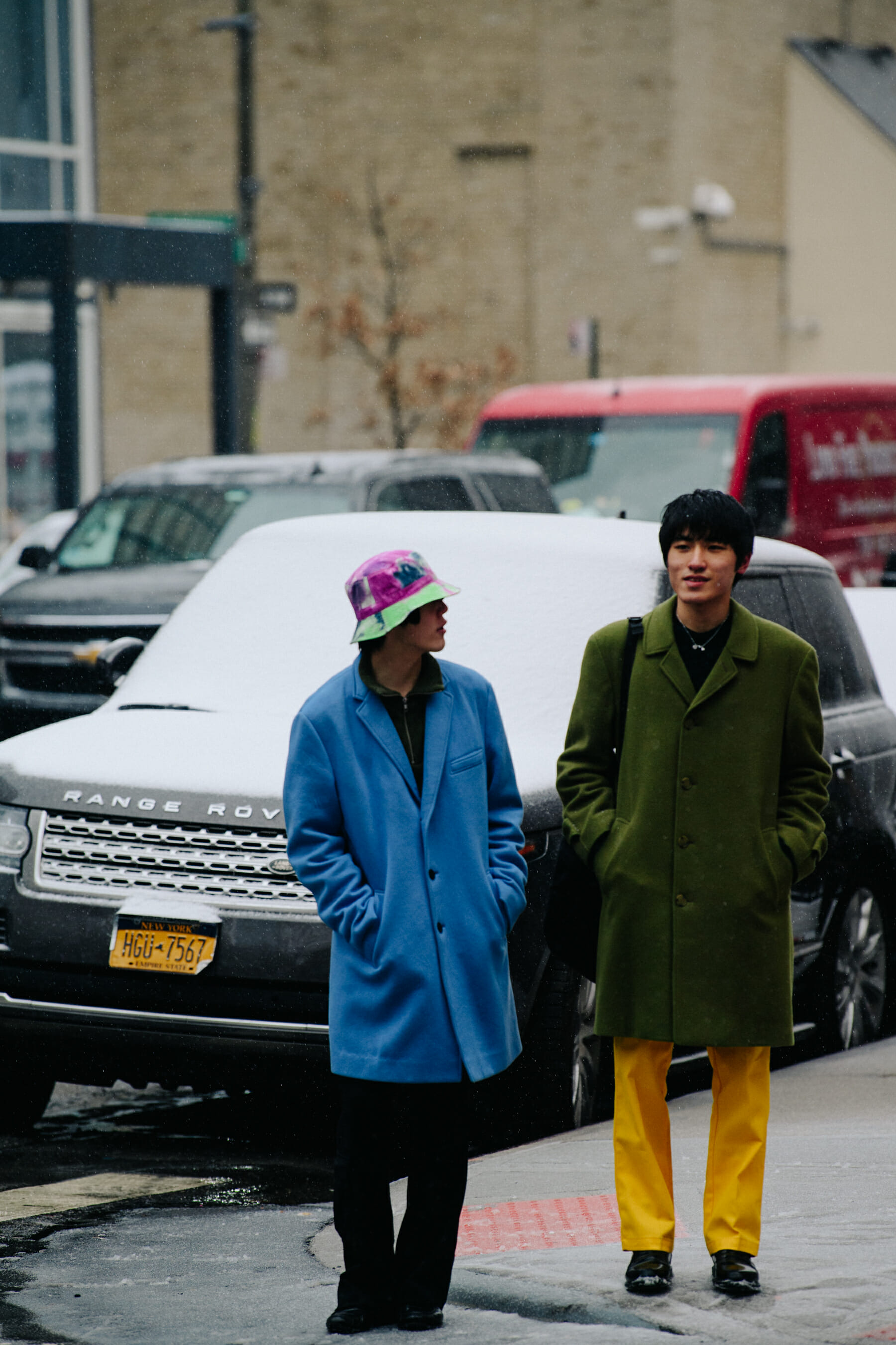 Two men wearing wool coats