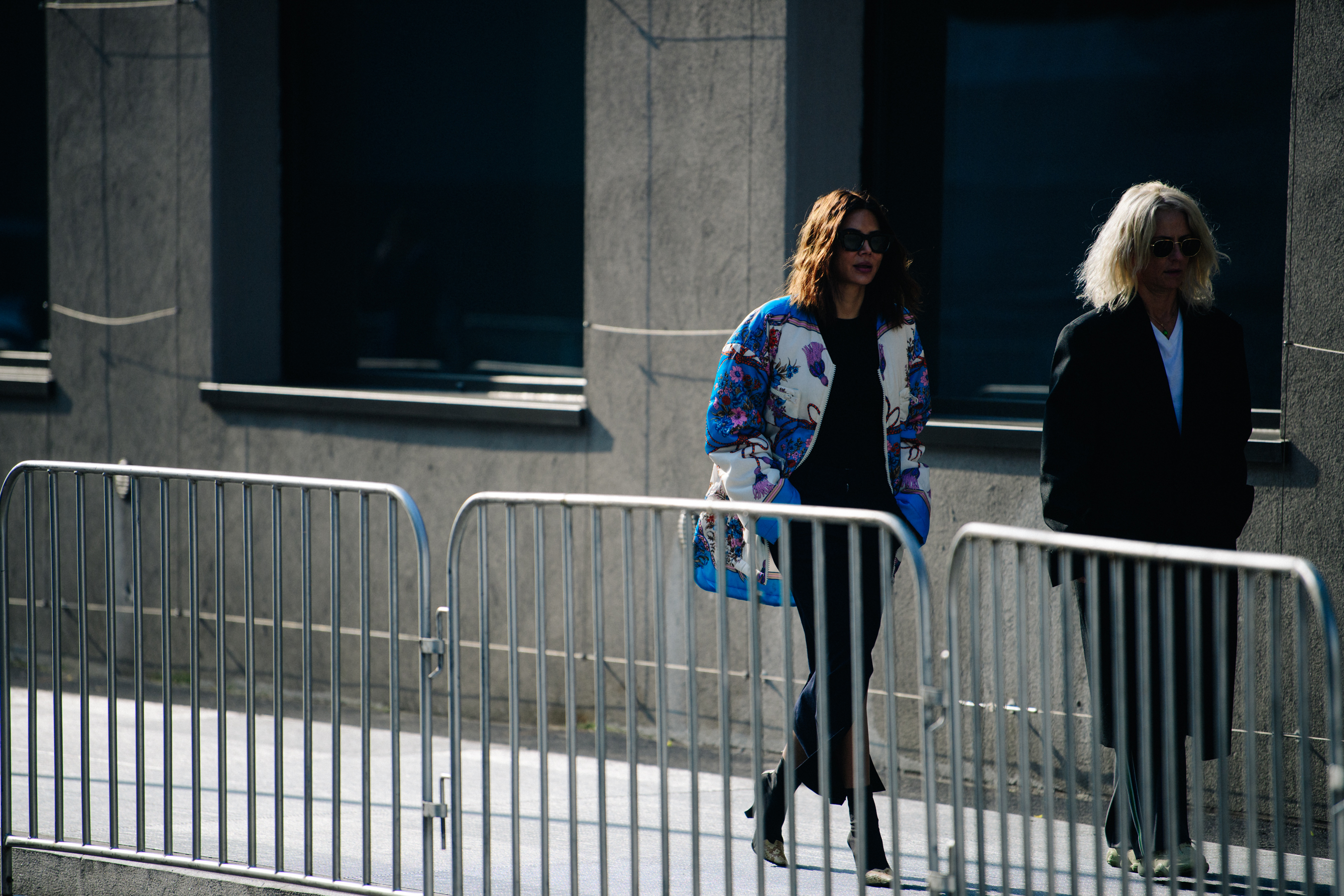 Two women wearing winter jackets
