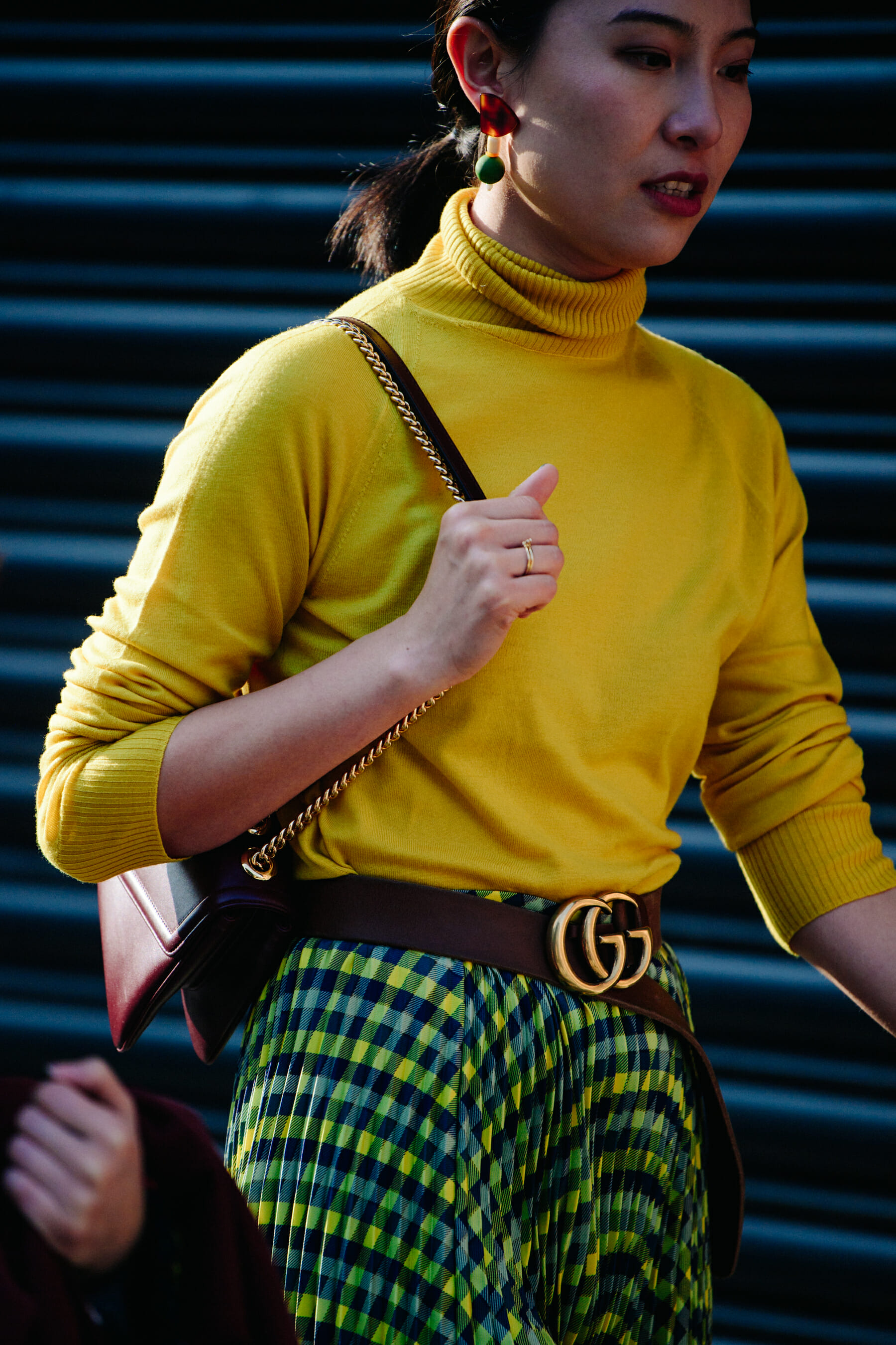 Woman wearing yellow top