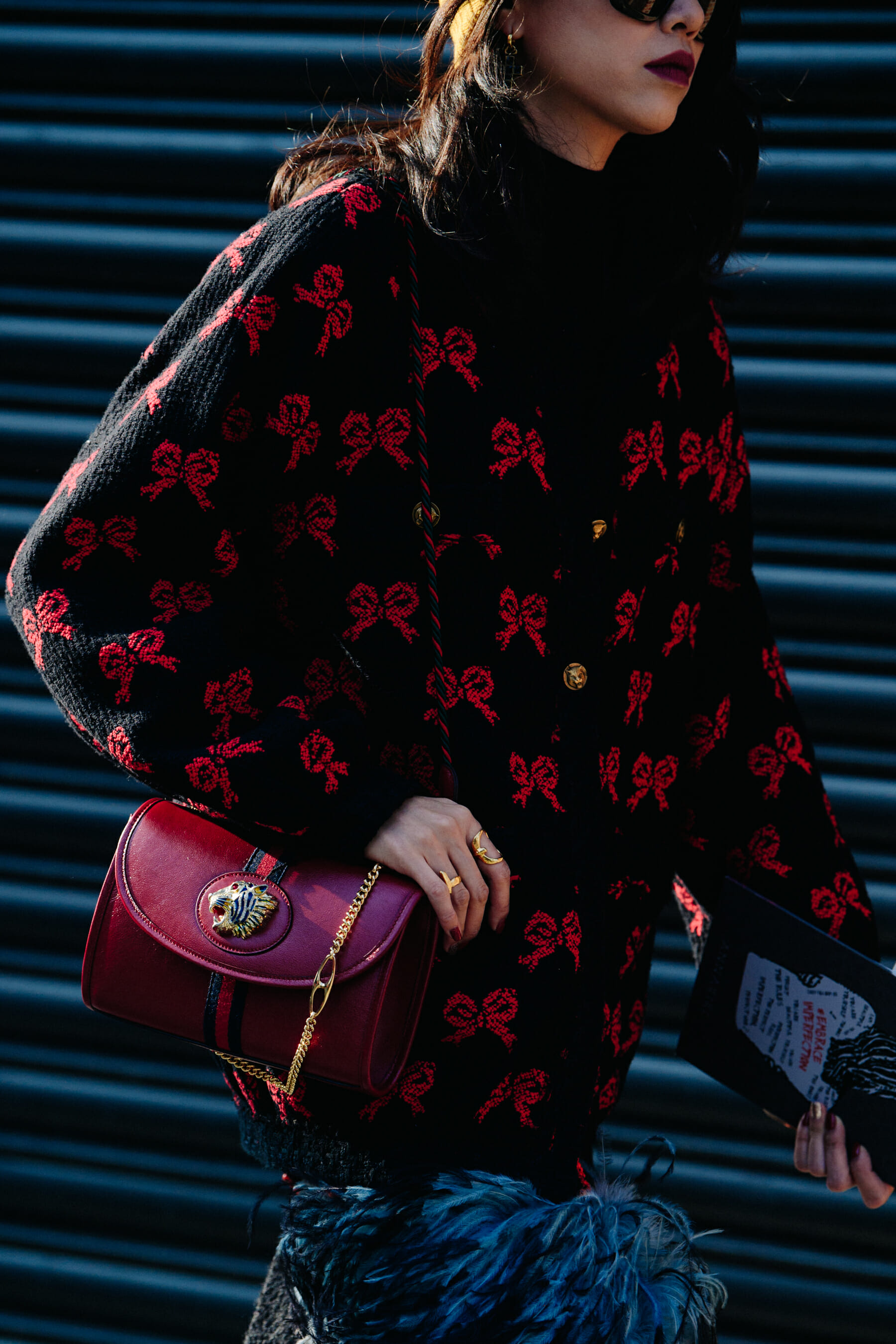 Woman wearing red pattern jumper
