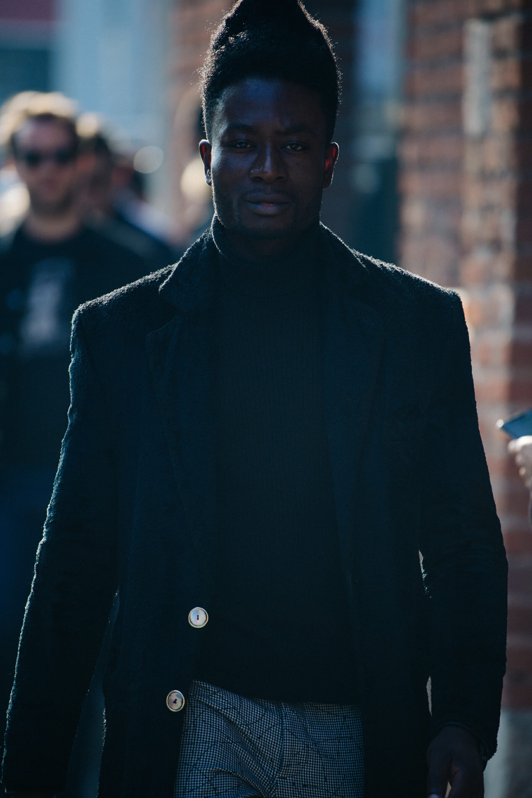 Man wearing black outfit