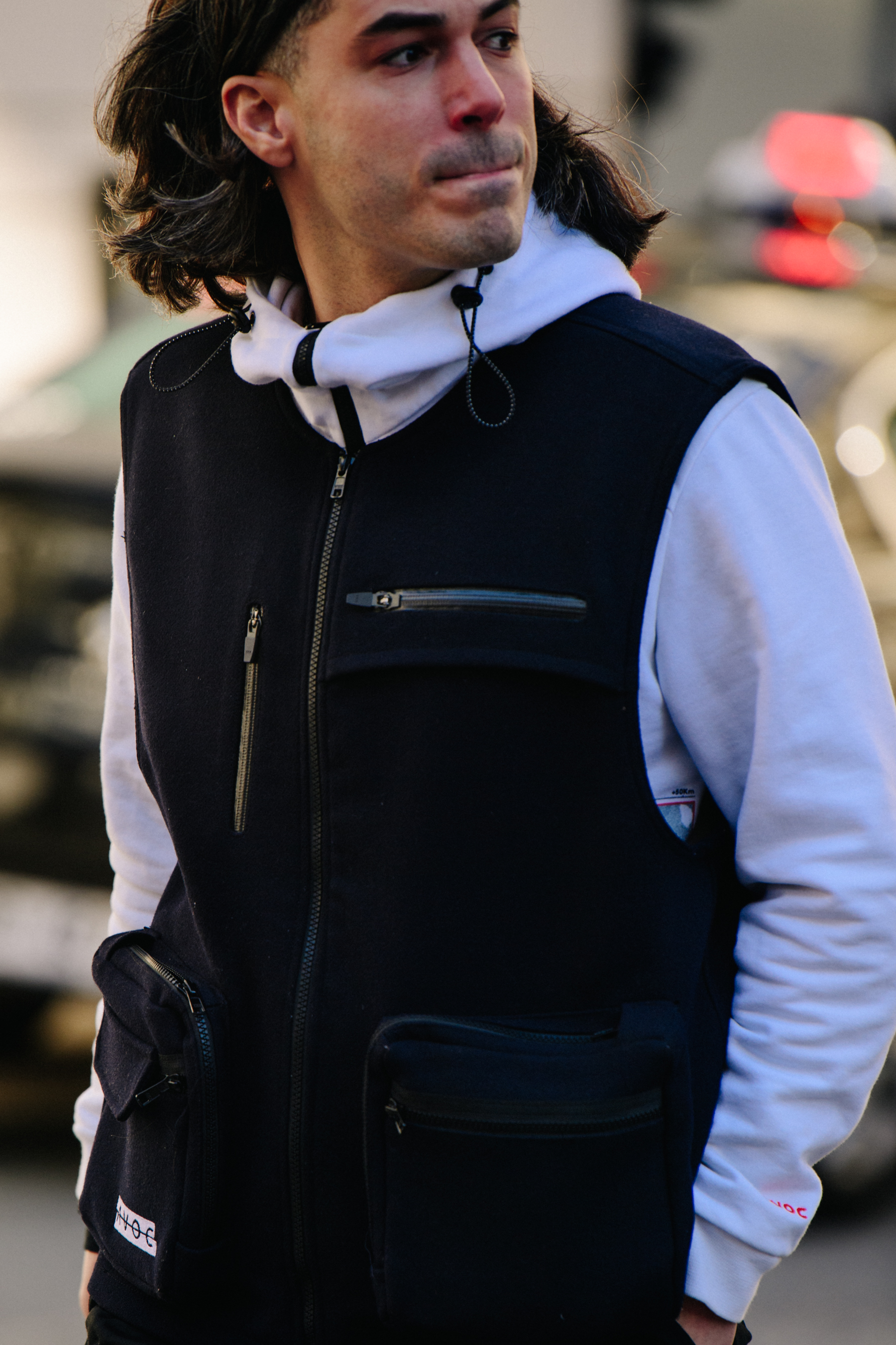 Man wearing black vest