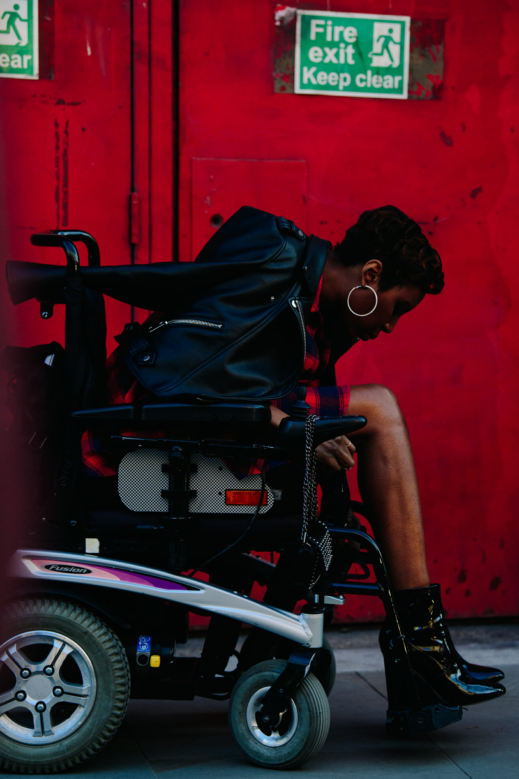 Woman in wheelchair at fashion show