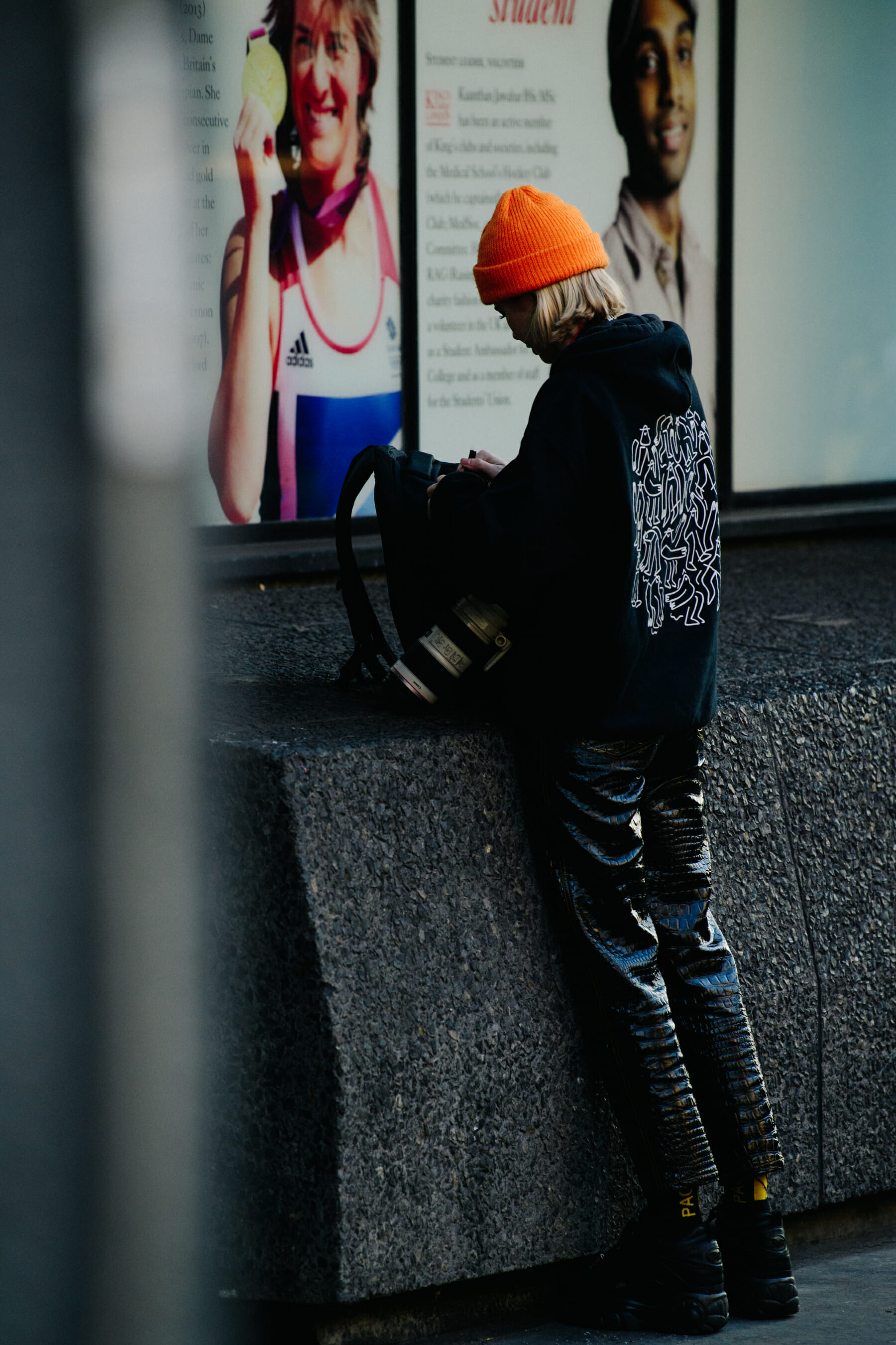 Woman wearing orange beanie