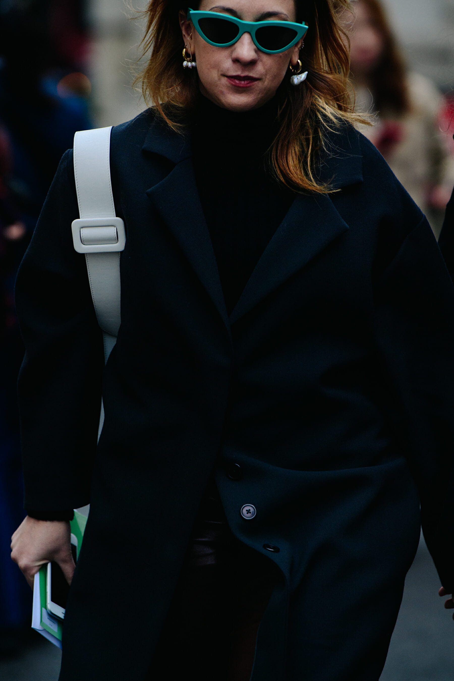 Woman wearing blue glasses