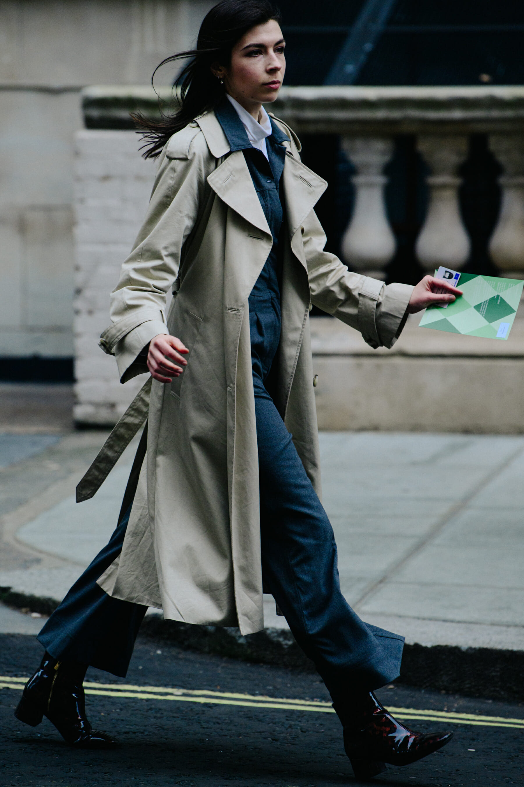 Woman wearing pale coat