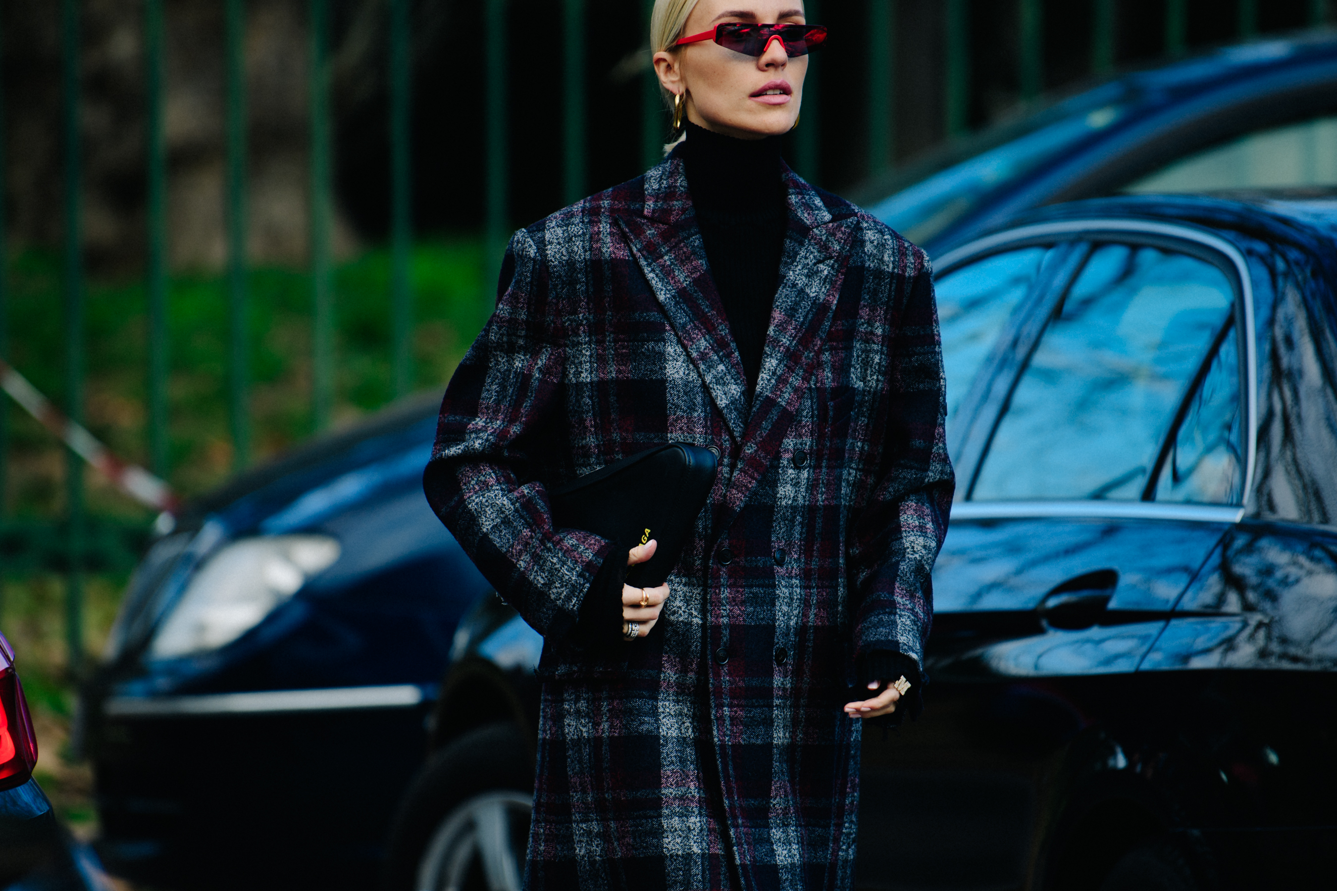 Woman wearing red sports glasses