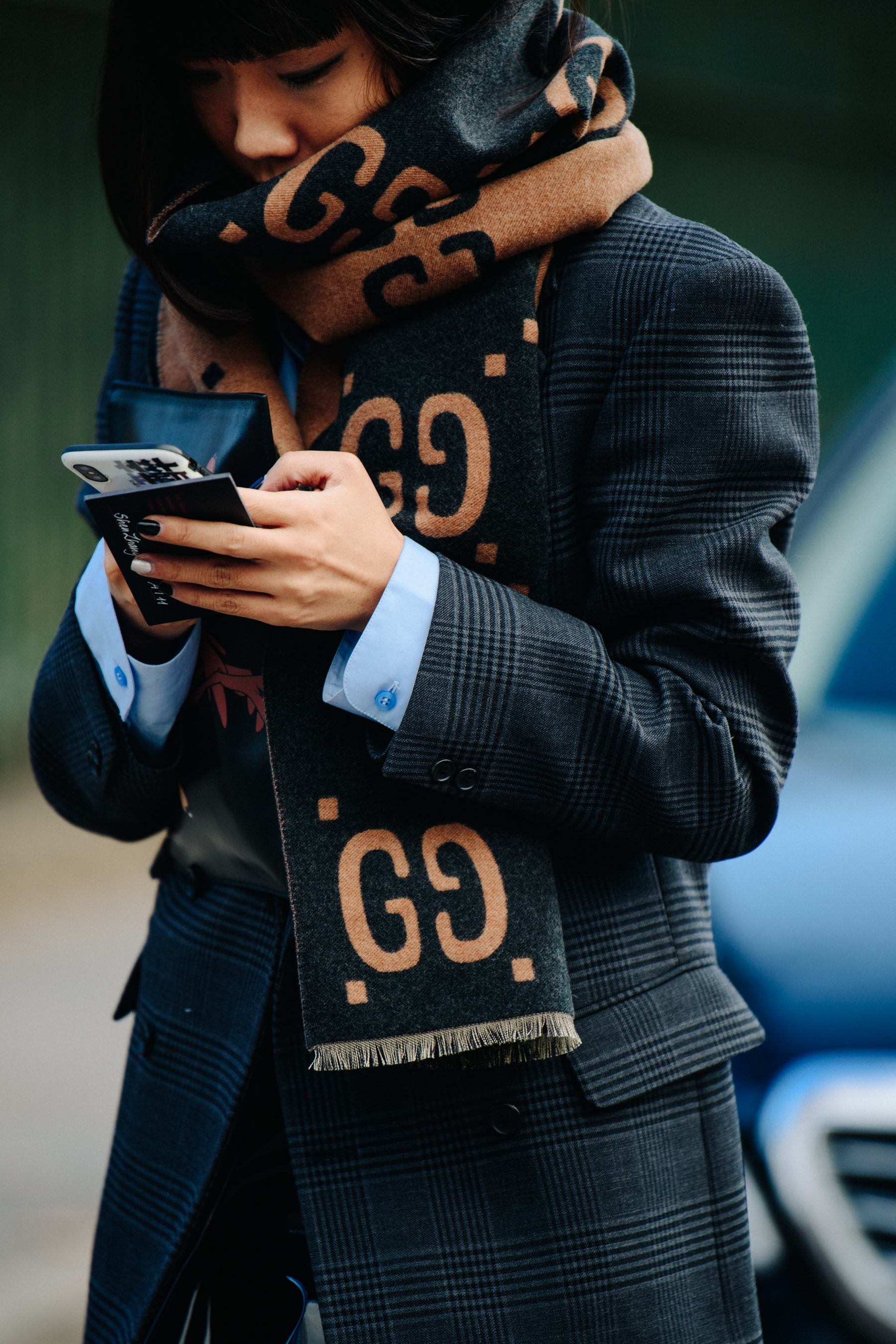 Woman wearing Gucci scarf