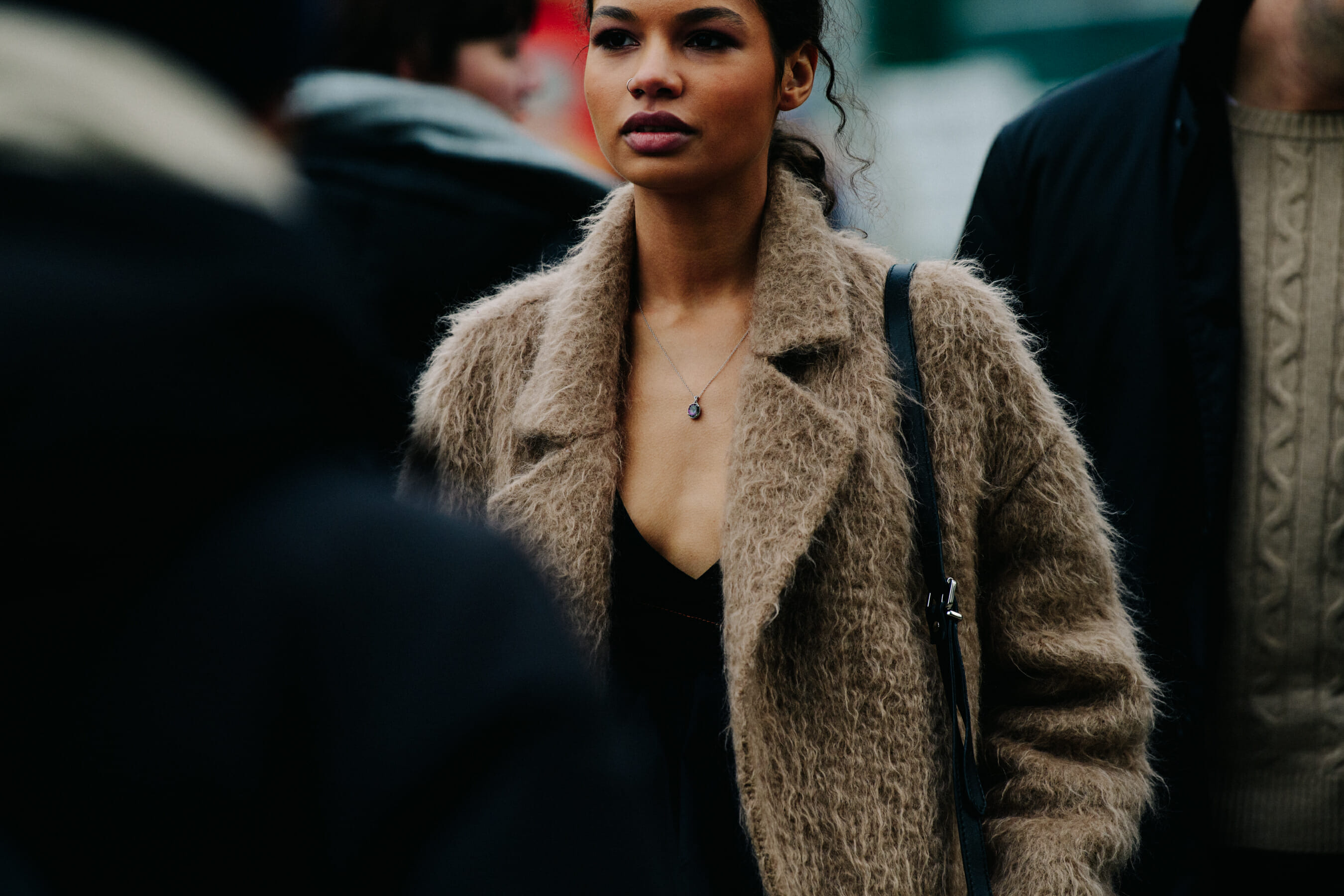 Woman wearing brown wool jacket