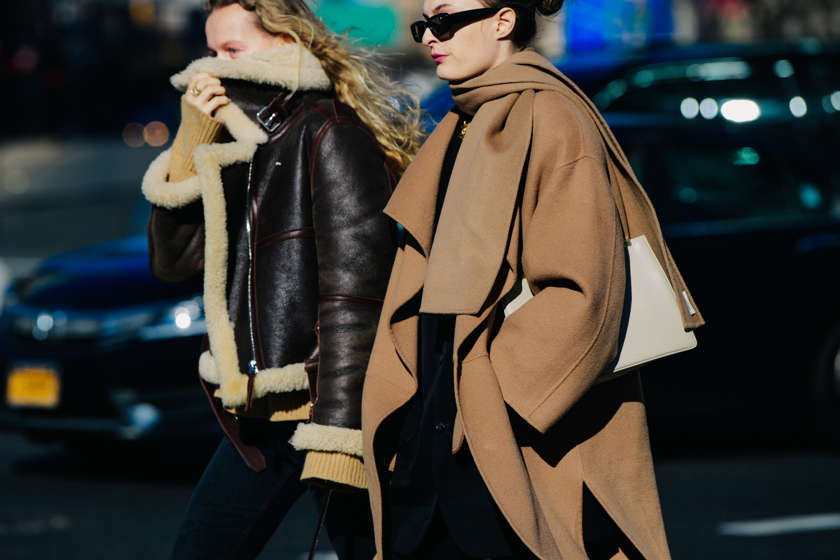 Two women wearing brown