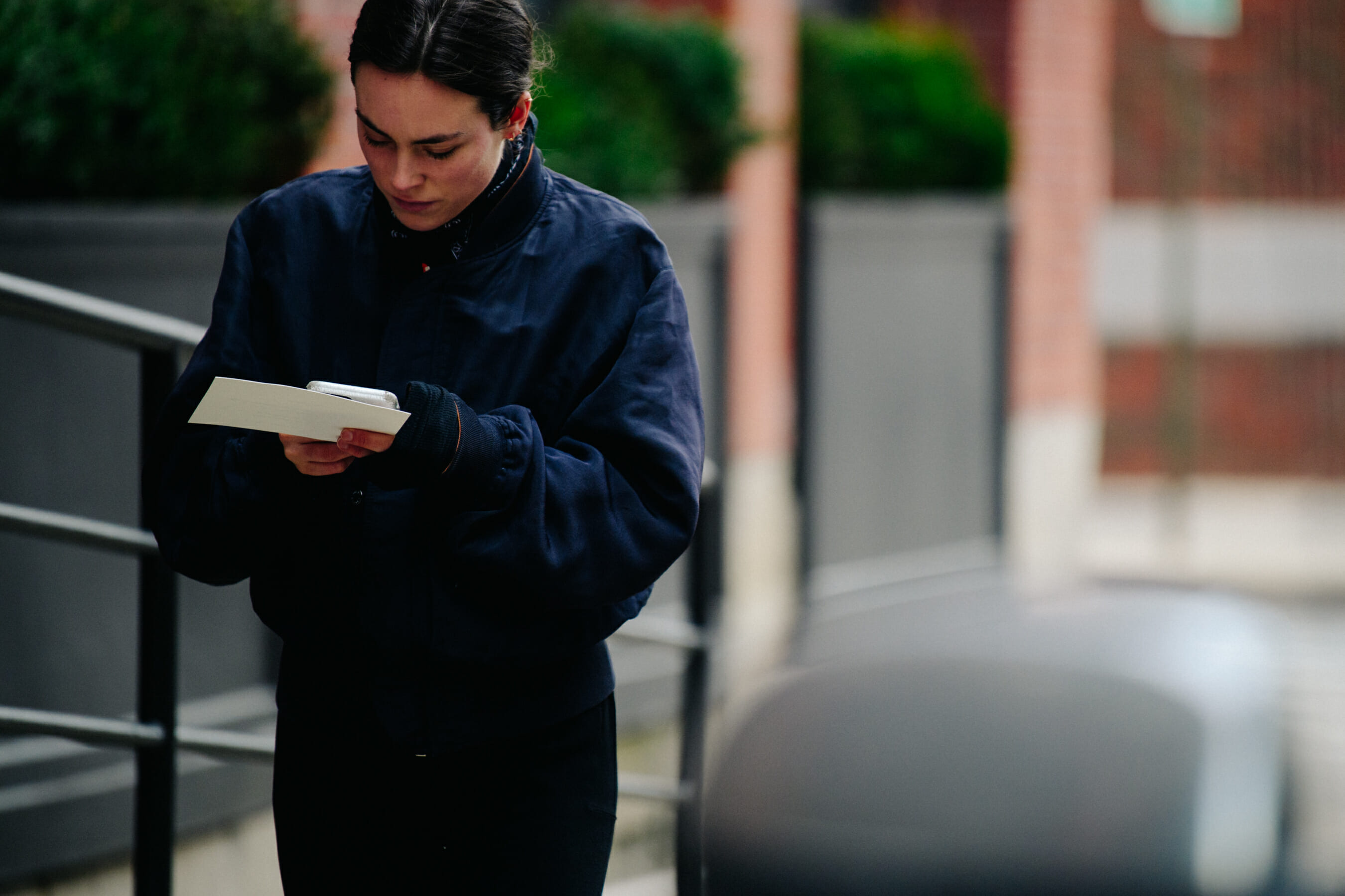 Woman wearing blue jacket