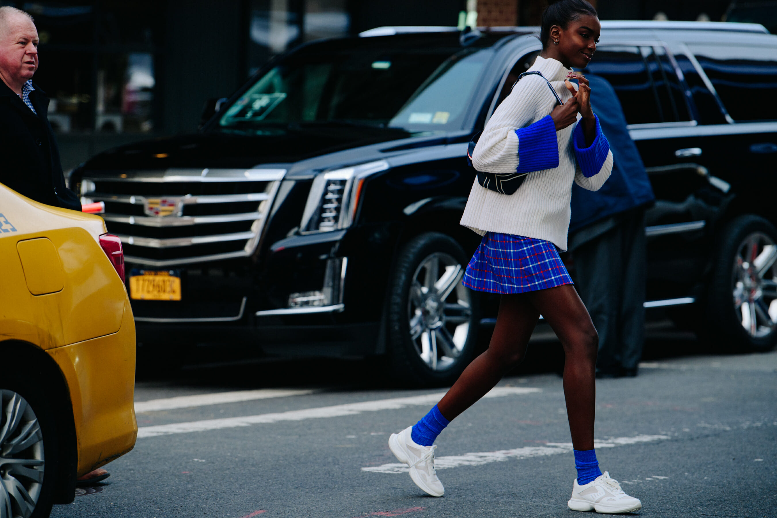 Woman wearing short blue skirt