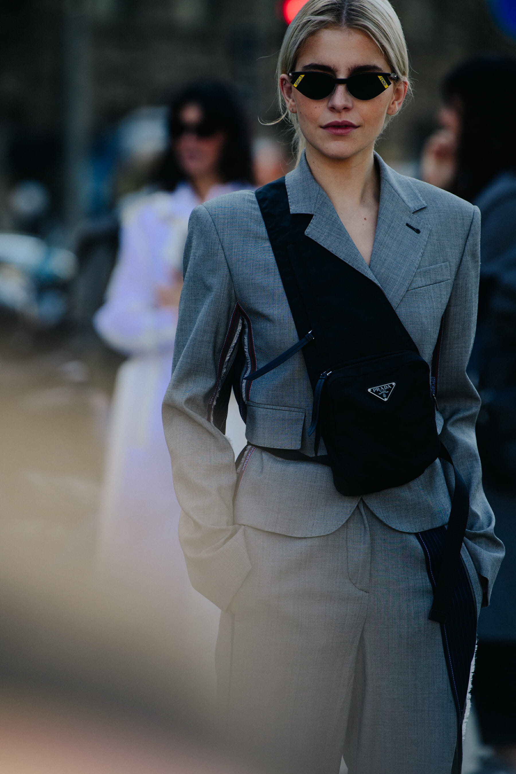 German blogger wearing grey suit