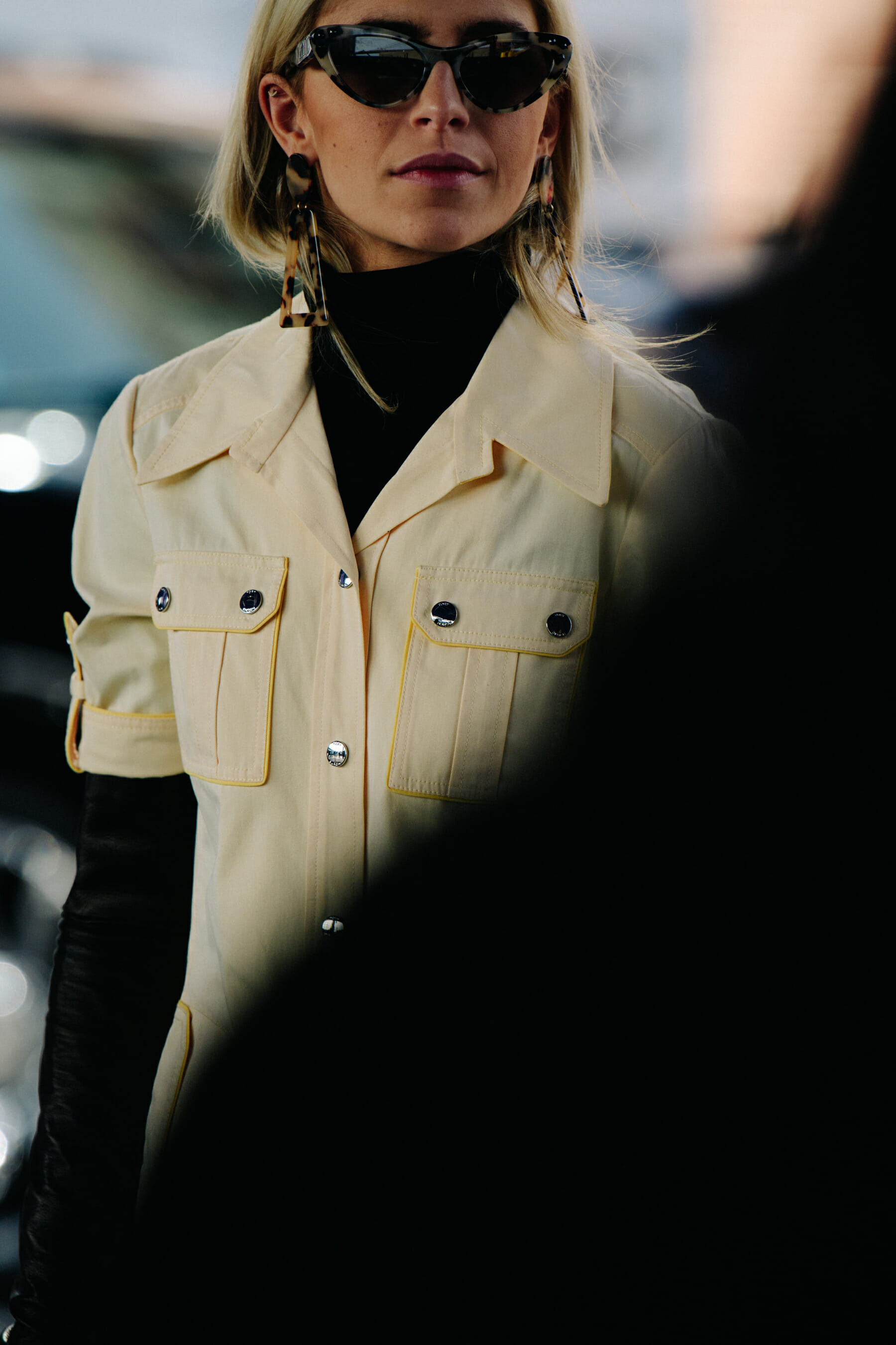 Blogger wearing pale suit