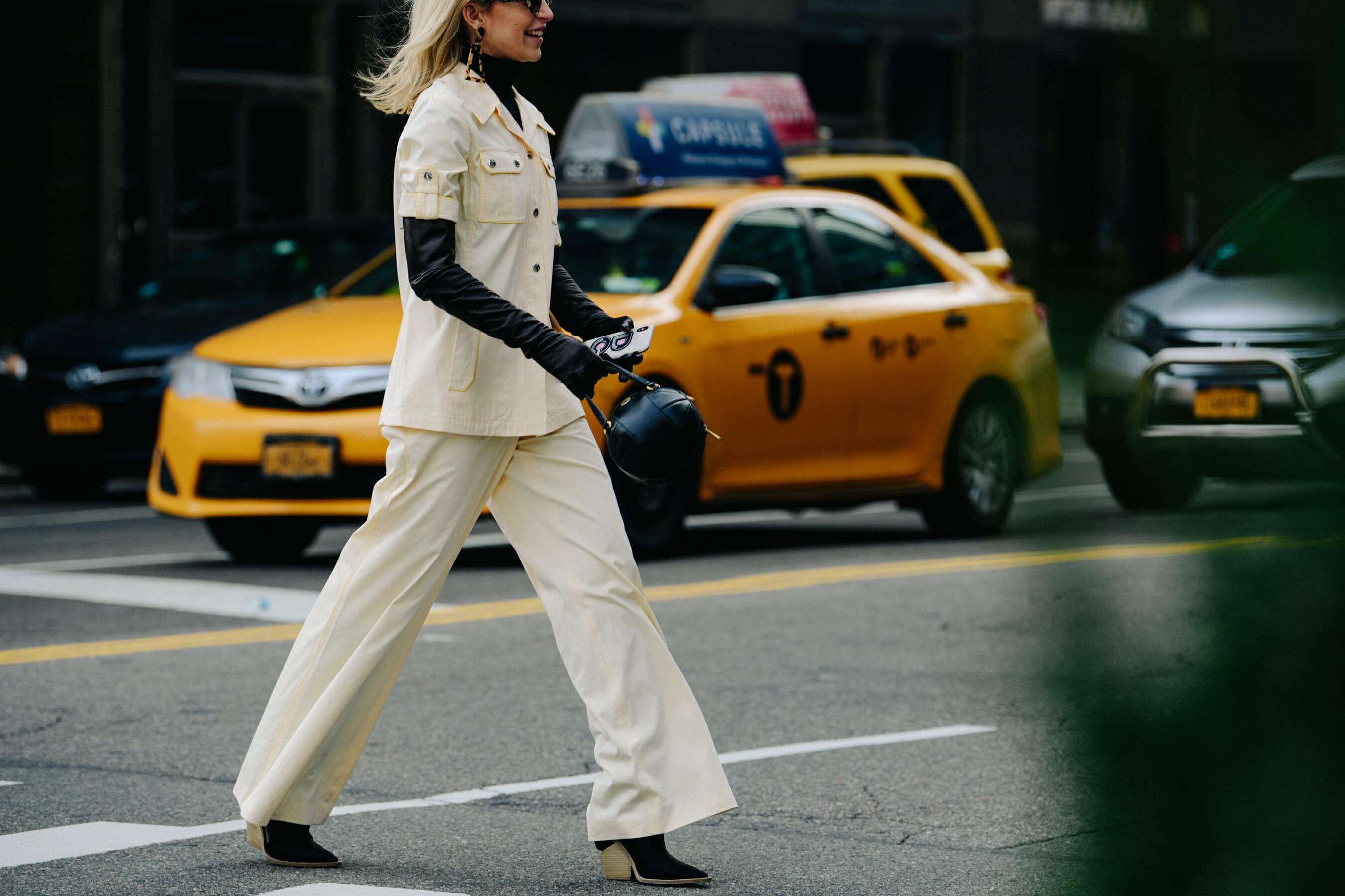 German blogger wearing white suit