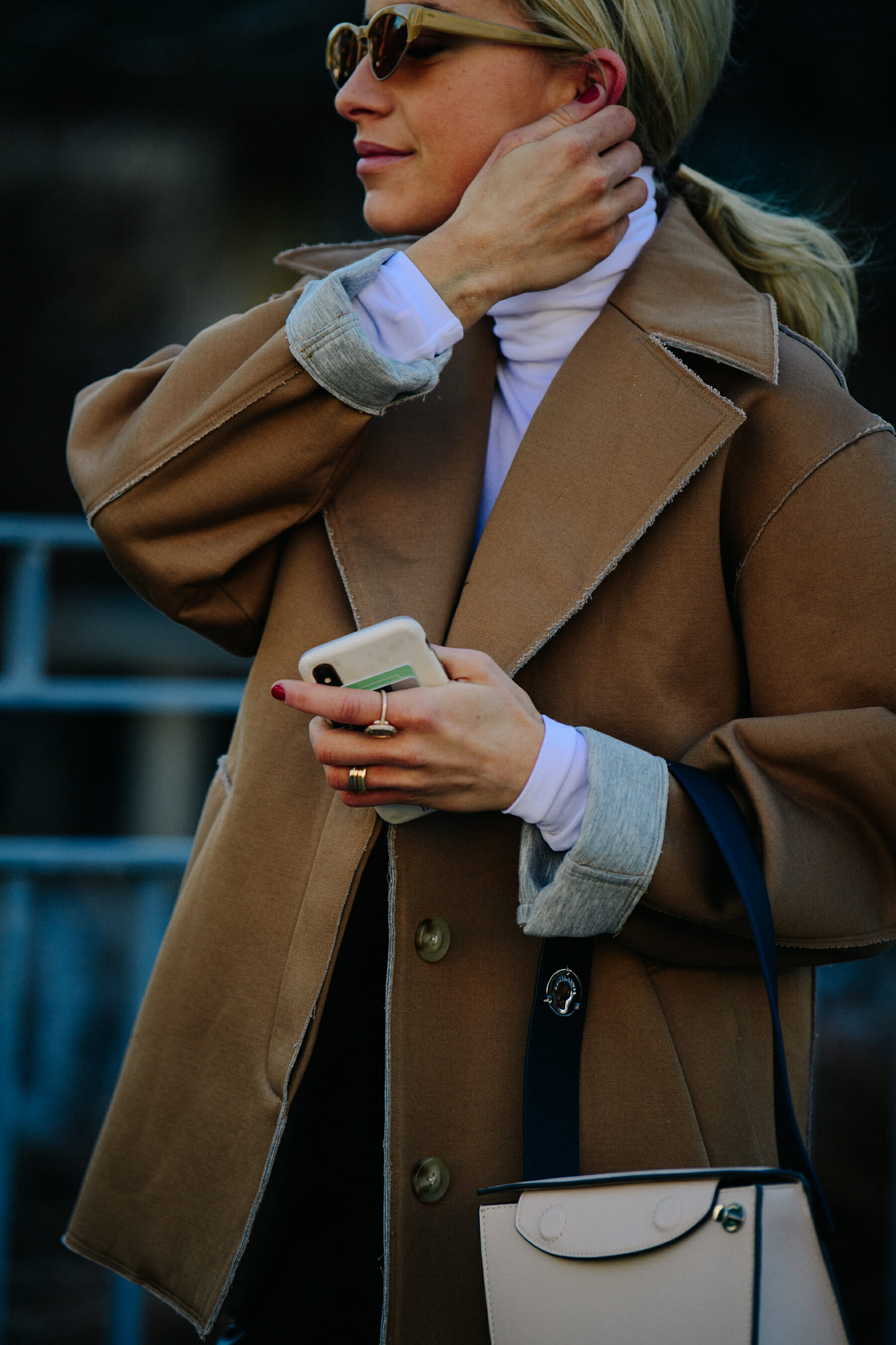 German blogger wearing brown coat