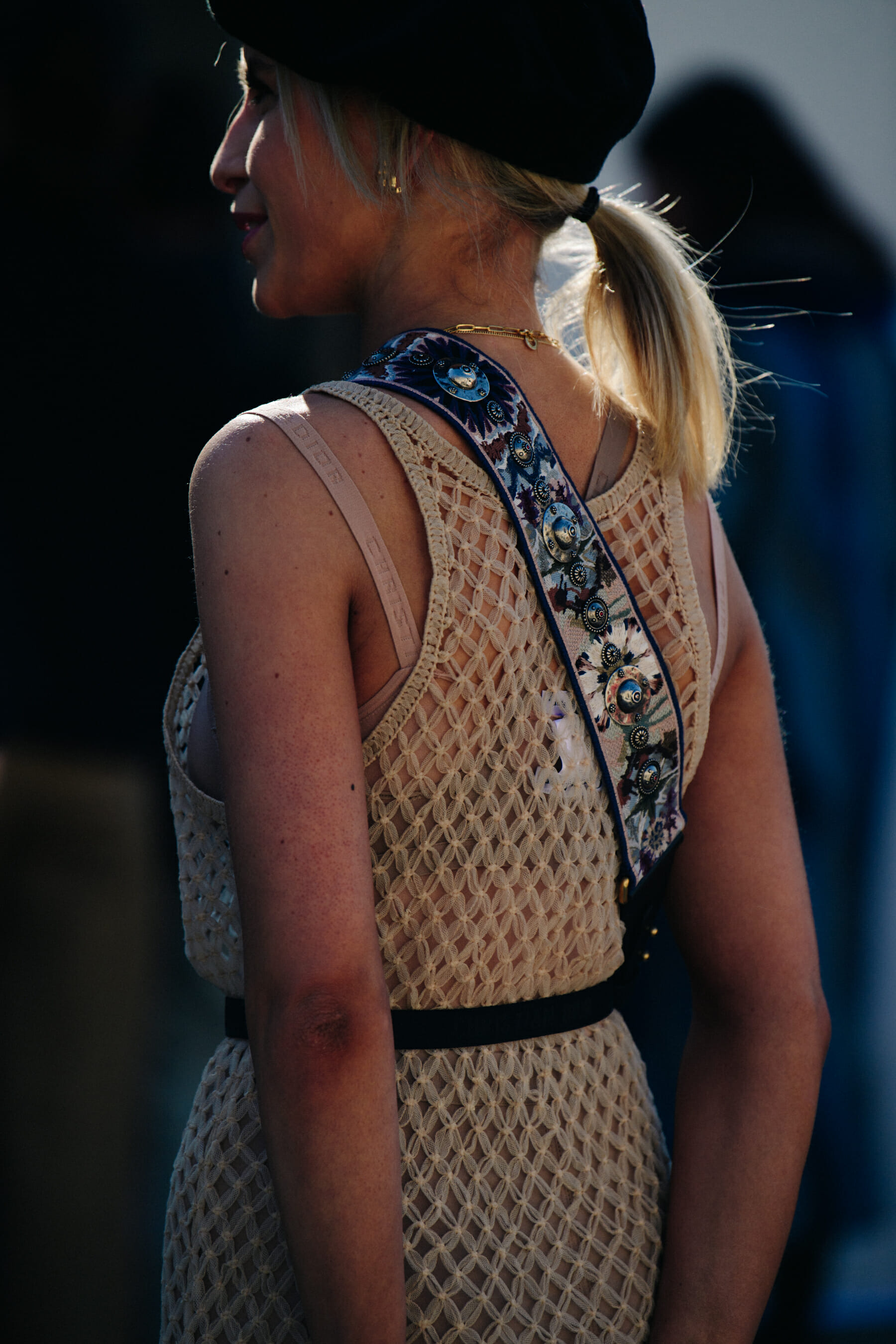 Woman wearing Christian Dior outfit