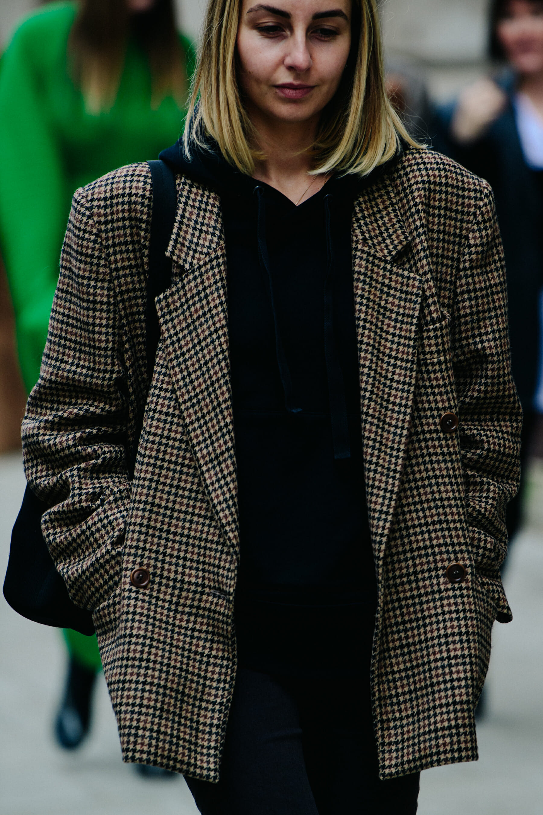 Woman wearing check jacket