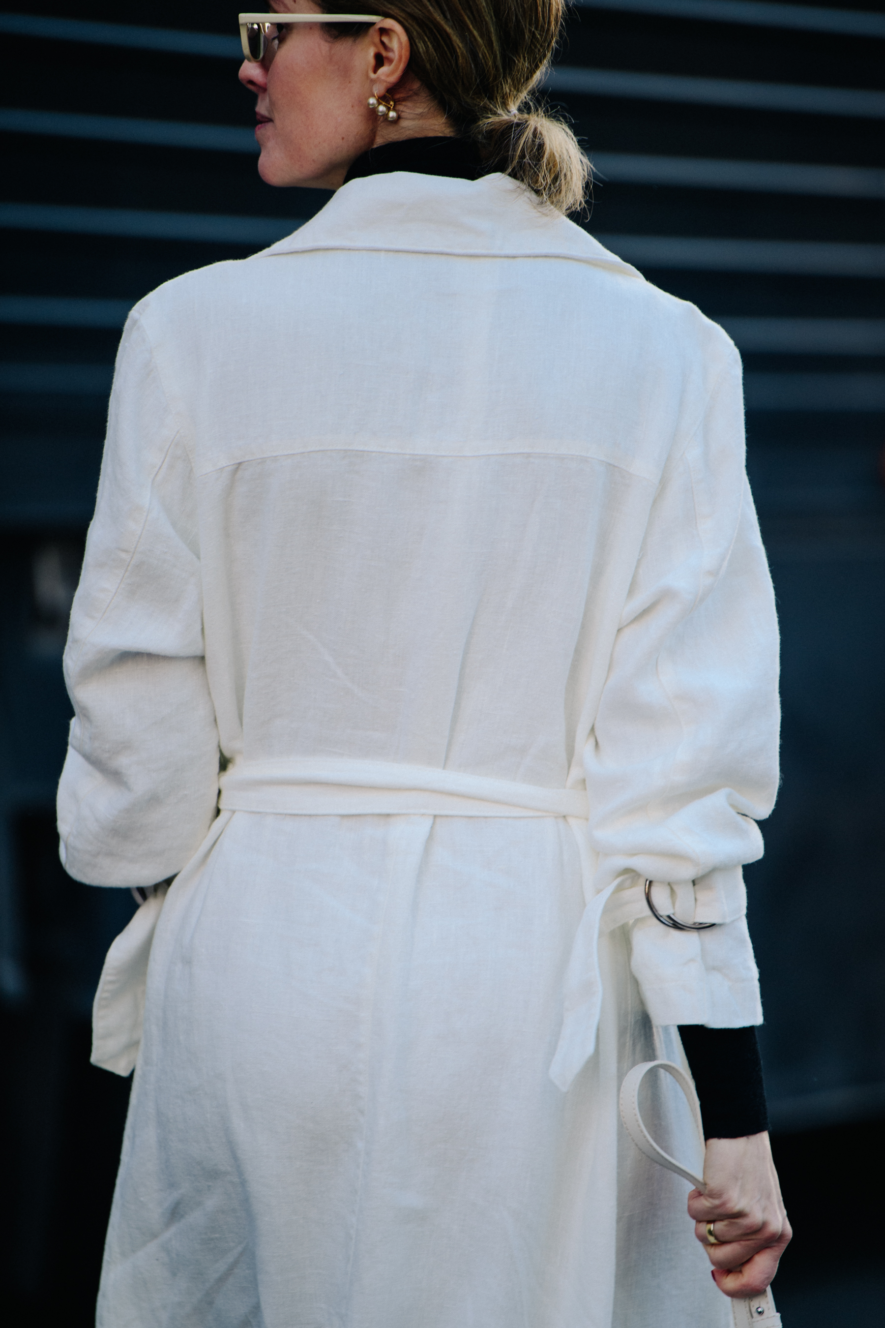 Woman wearing white coat