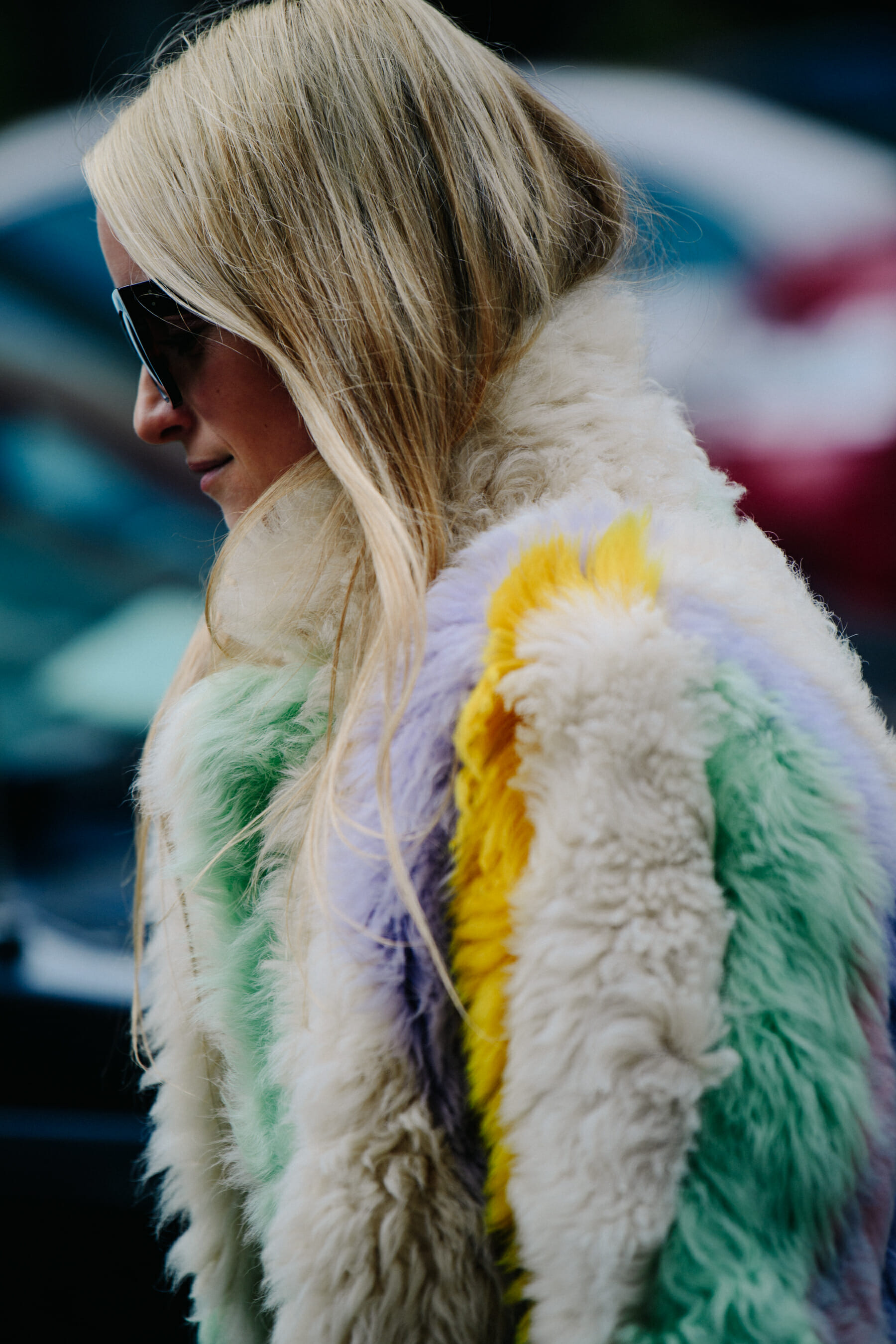 Woman wearing colourful fur coat