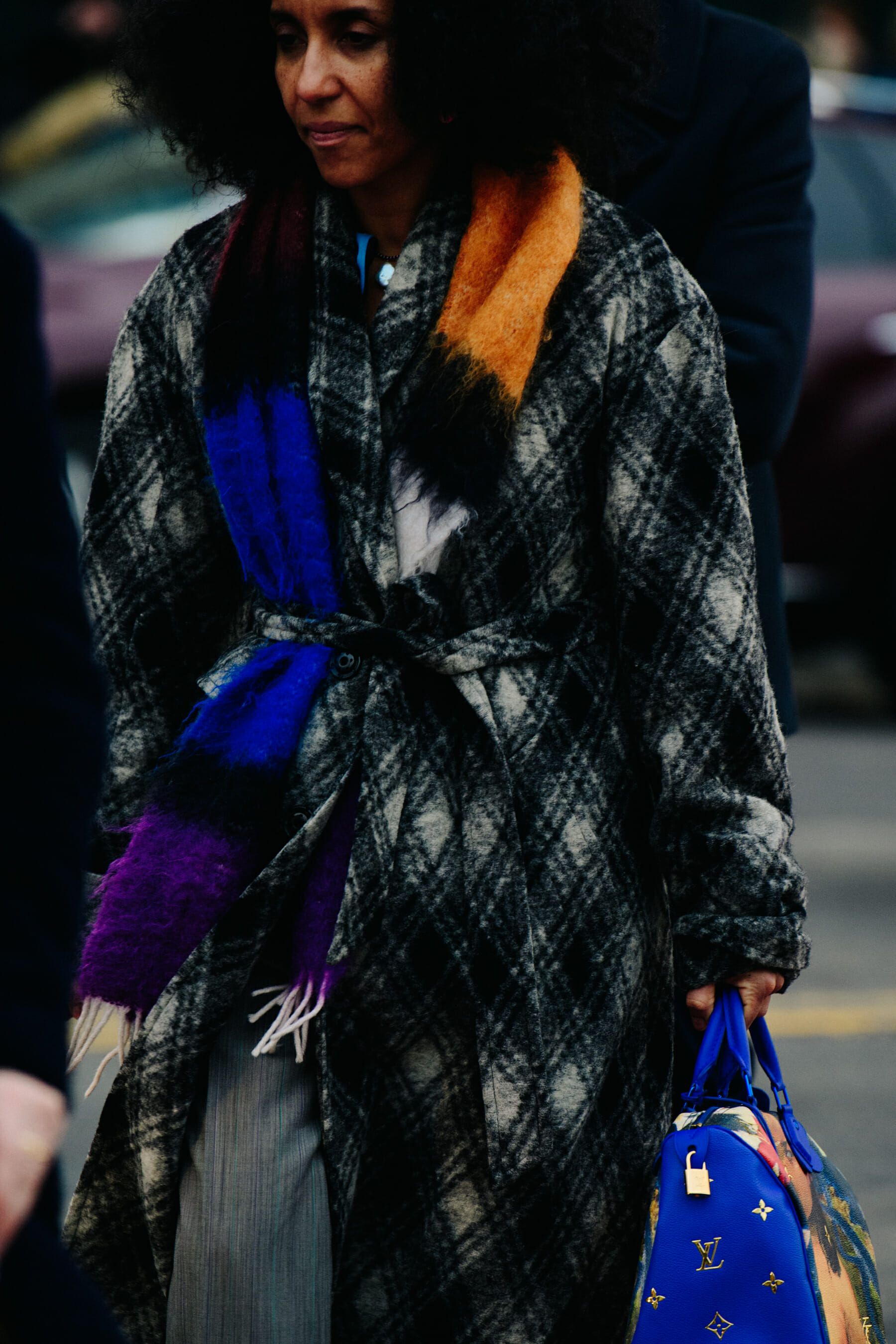 Woman wearing grey coat