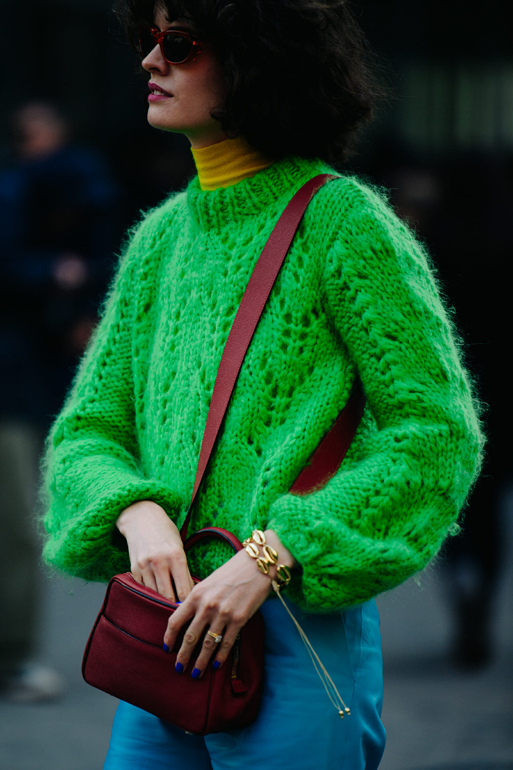 Woman wearing green wool coat