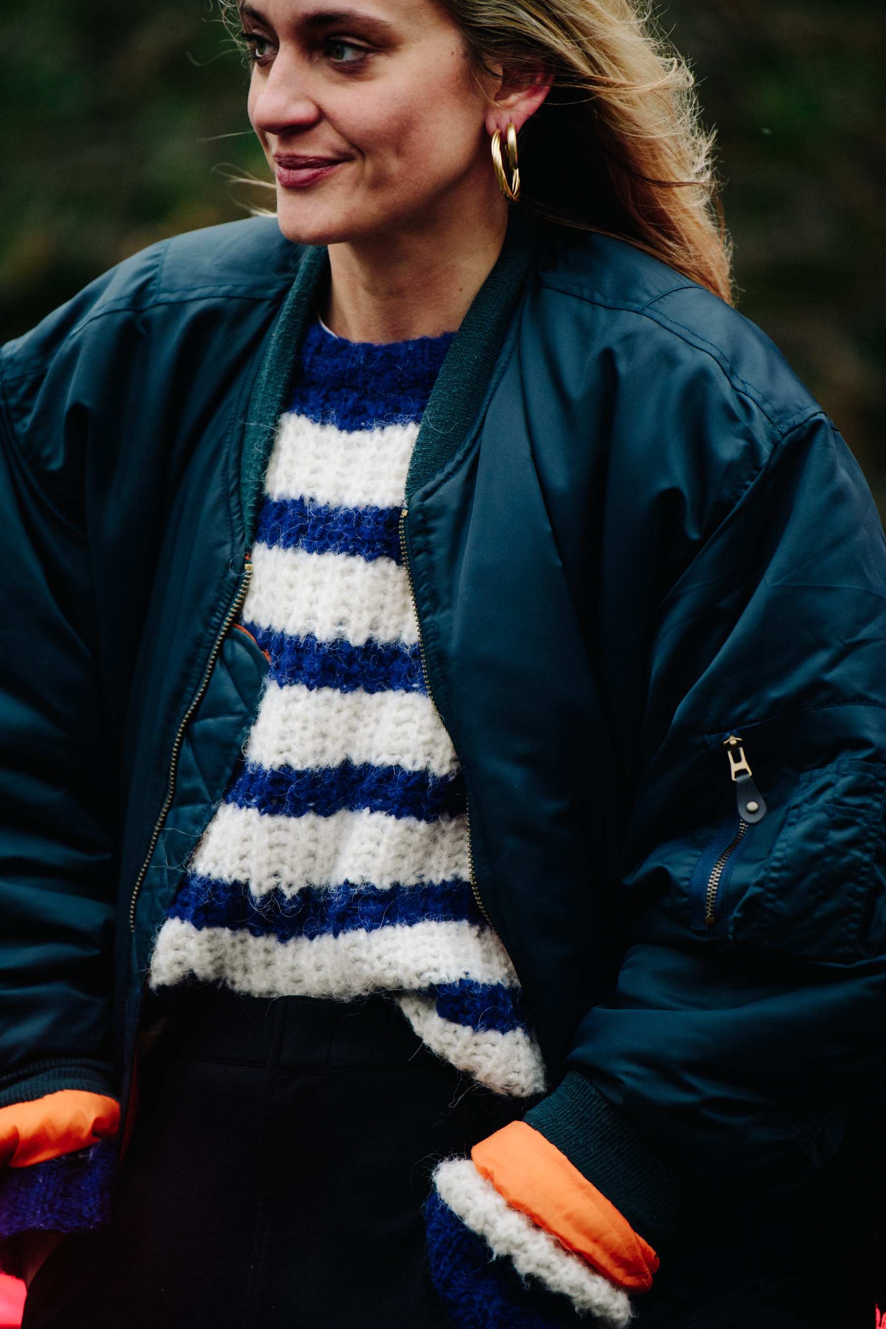 Woman wearing striped jumper