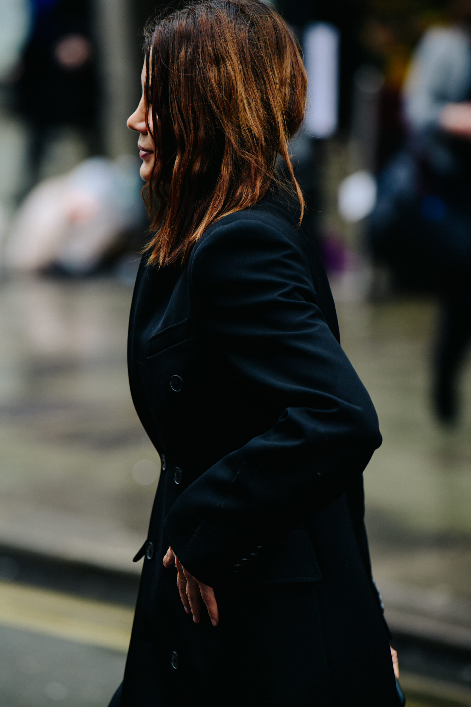Woman wearing black coat