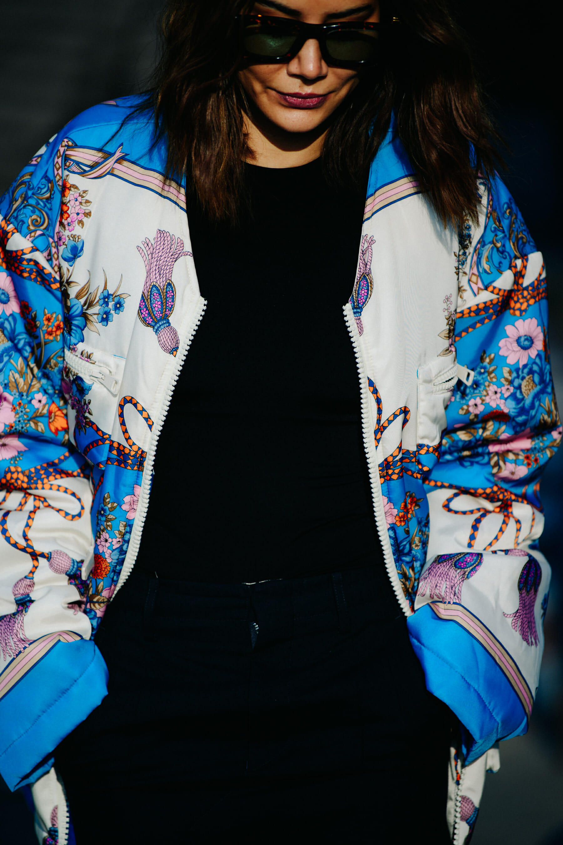 Woman wearing blue pattern jacket