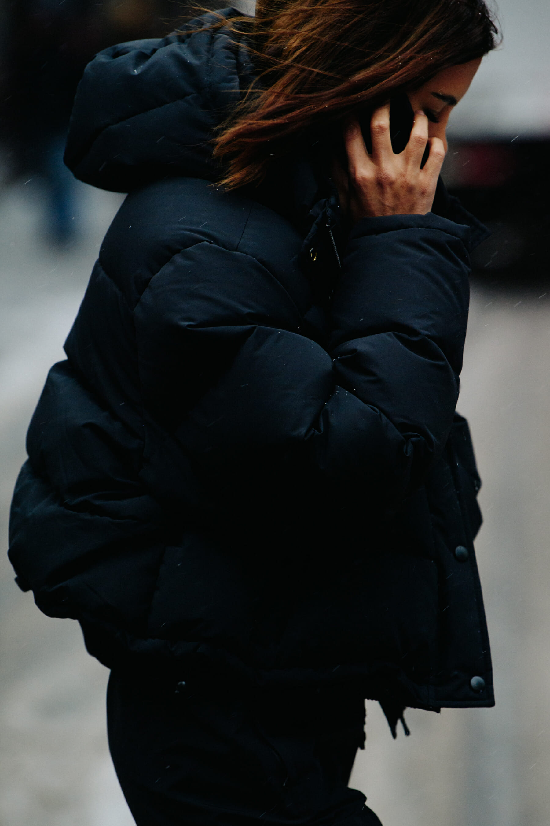 Woman wearing black winter coat