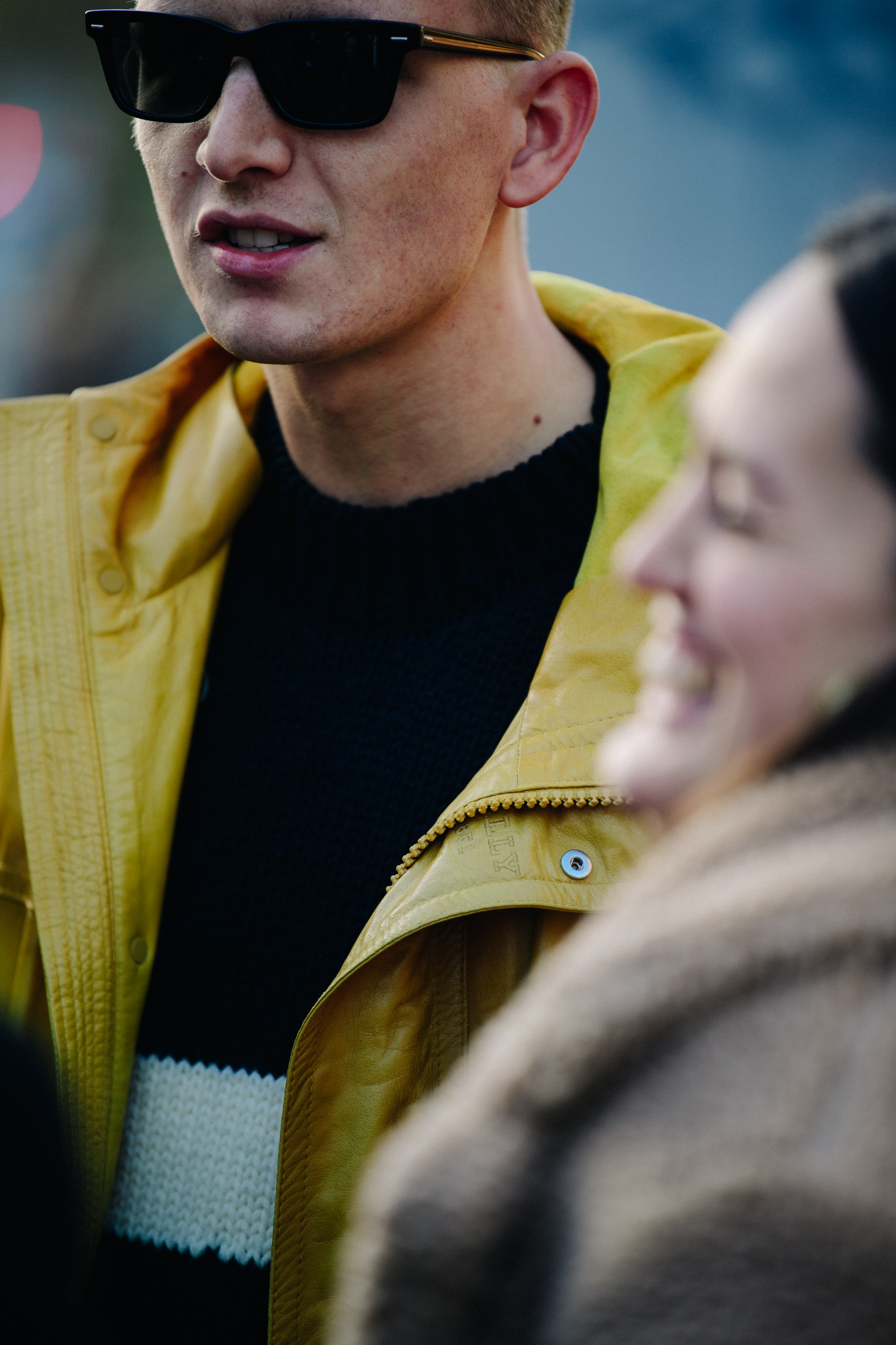 Man wearing yellow coat