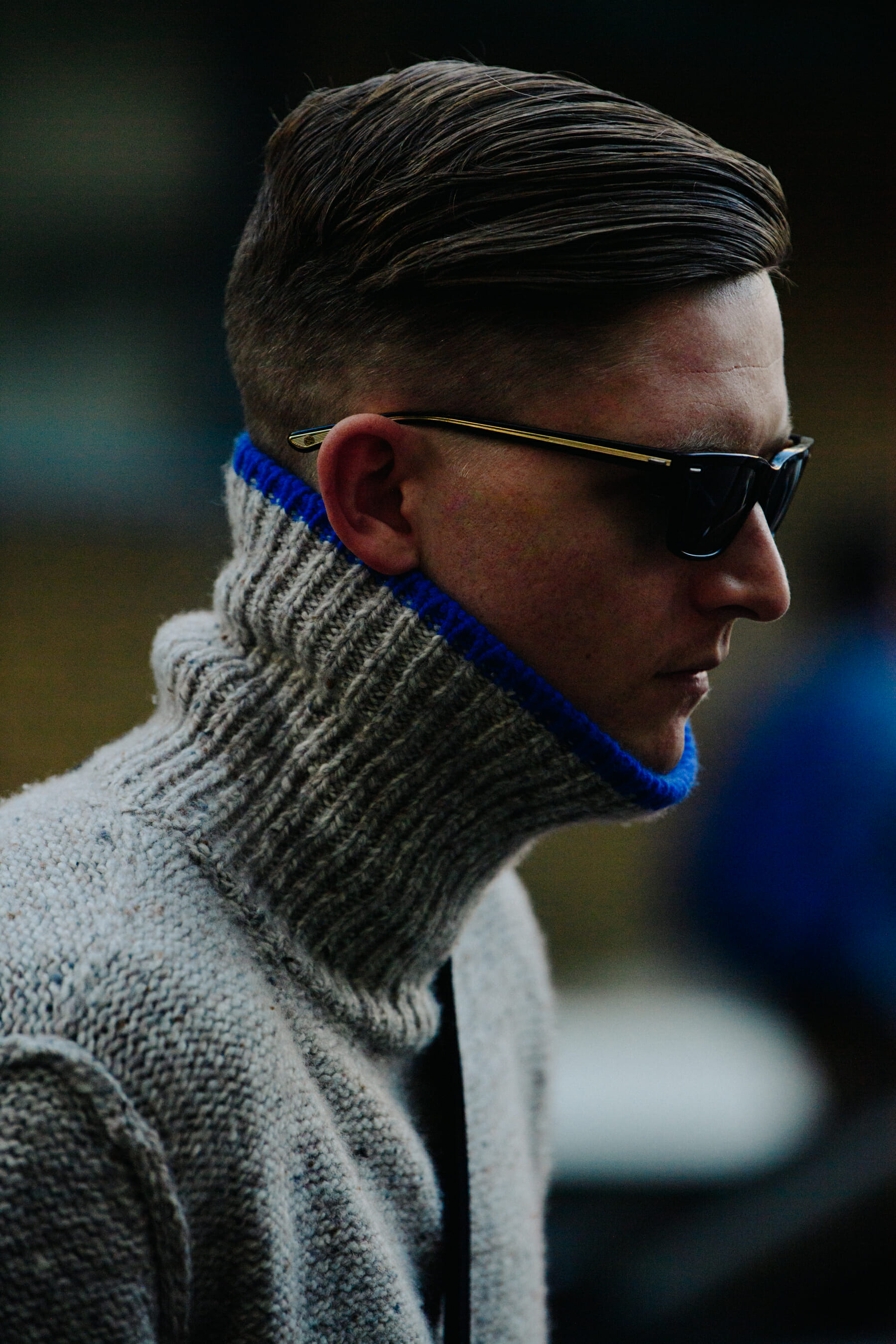 Man wearing grey wool jumper
