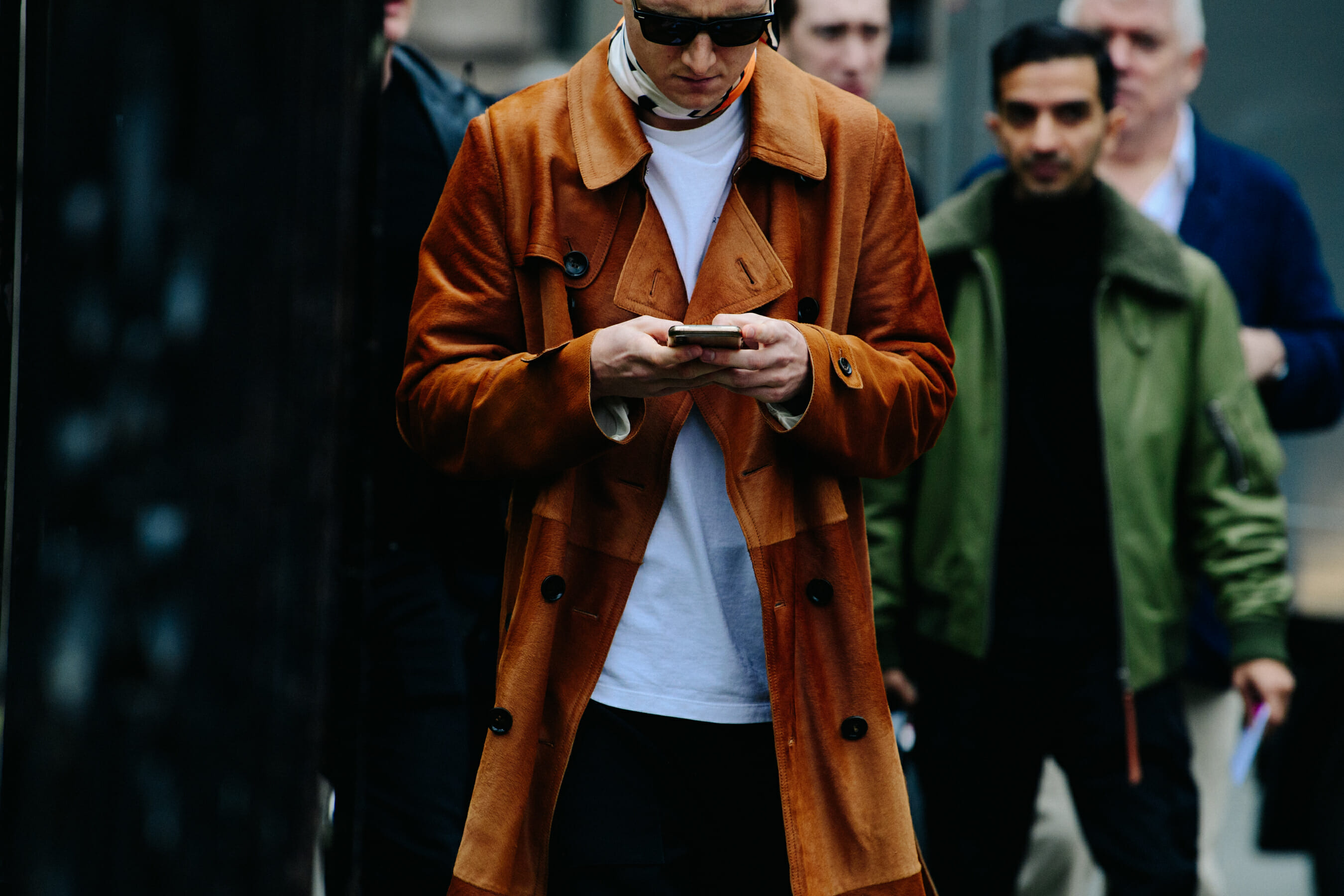 Man wearing brown coat