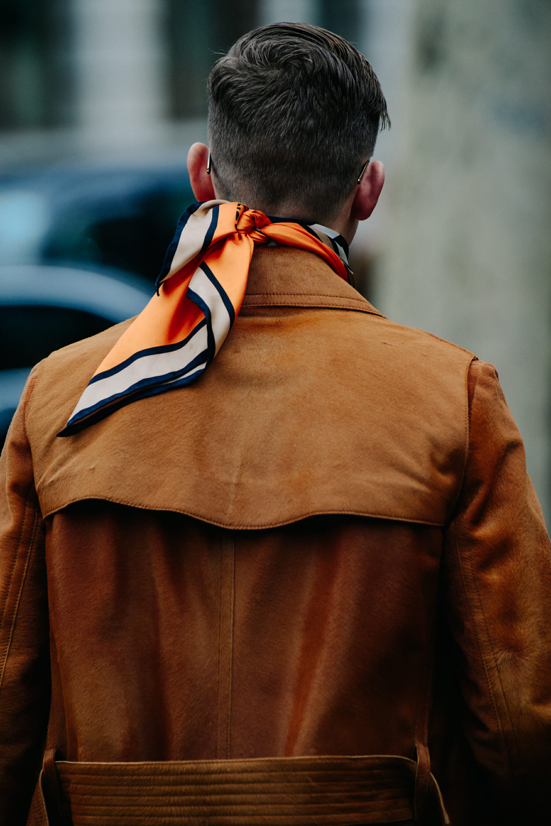 Man wearing brown coat