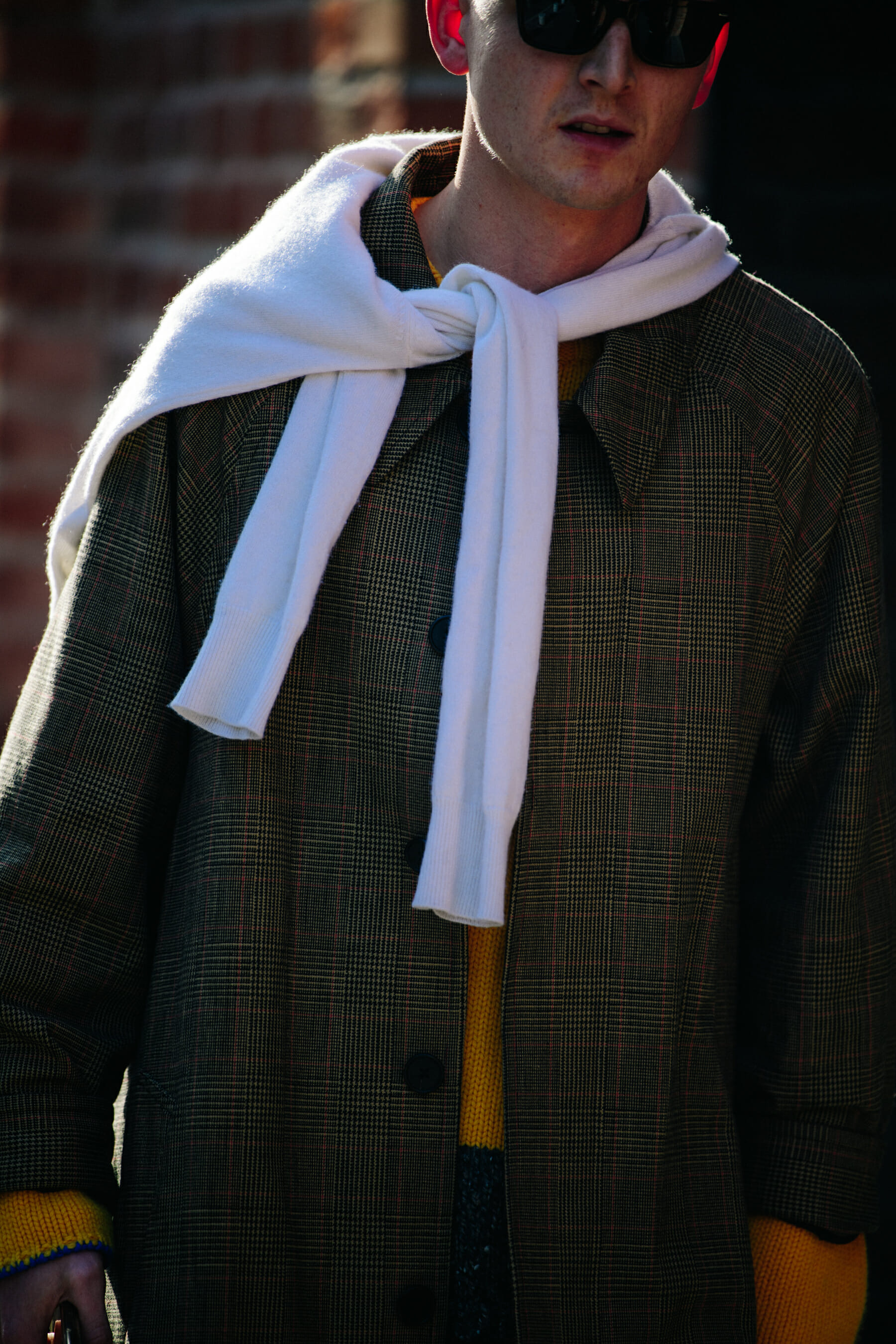 Man wearing check coat