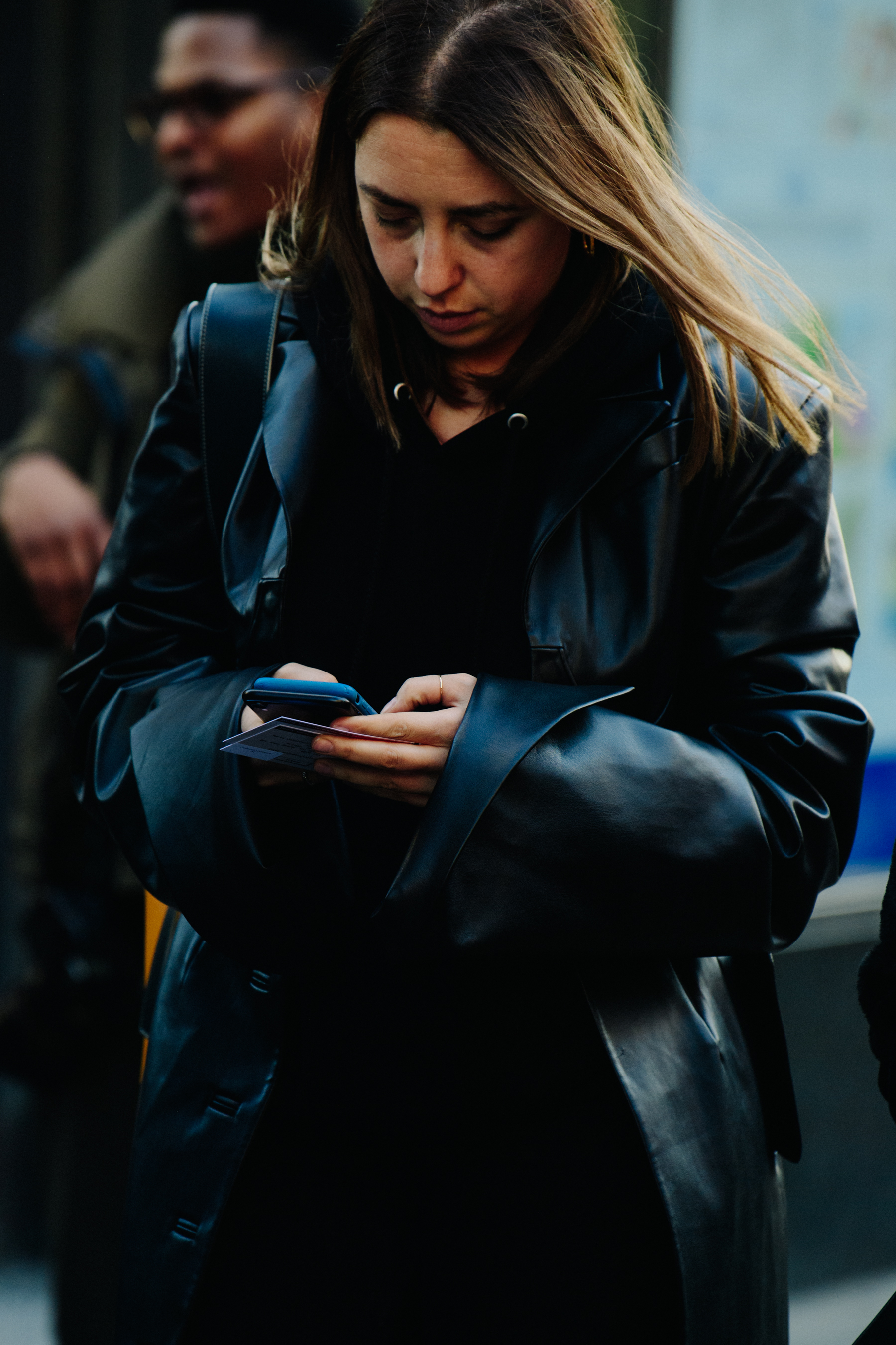 Woman wearing black leather jacket