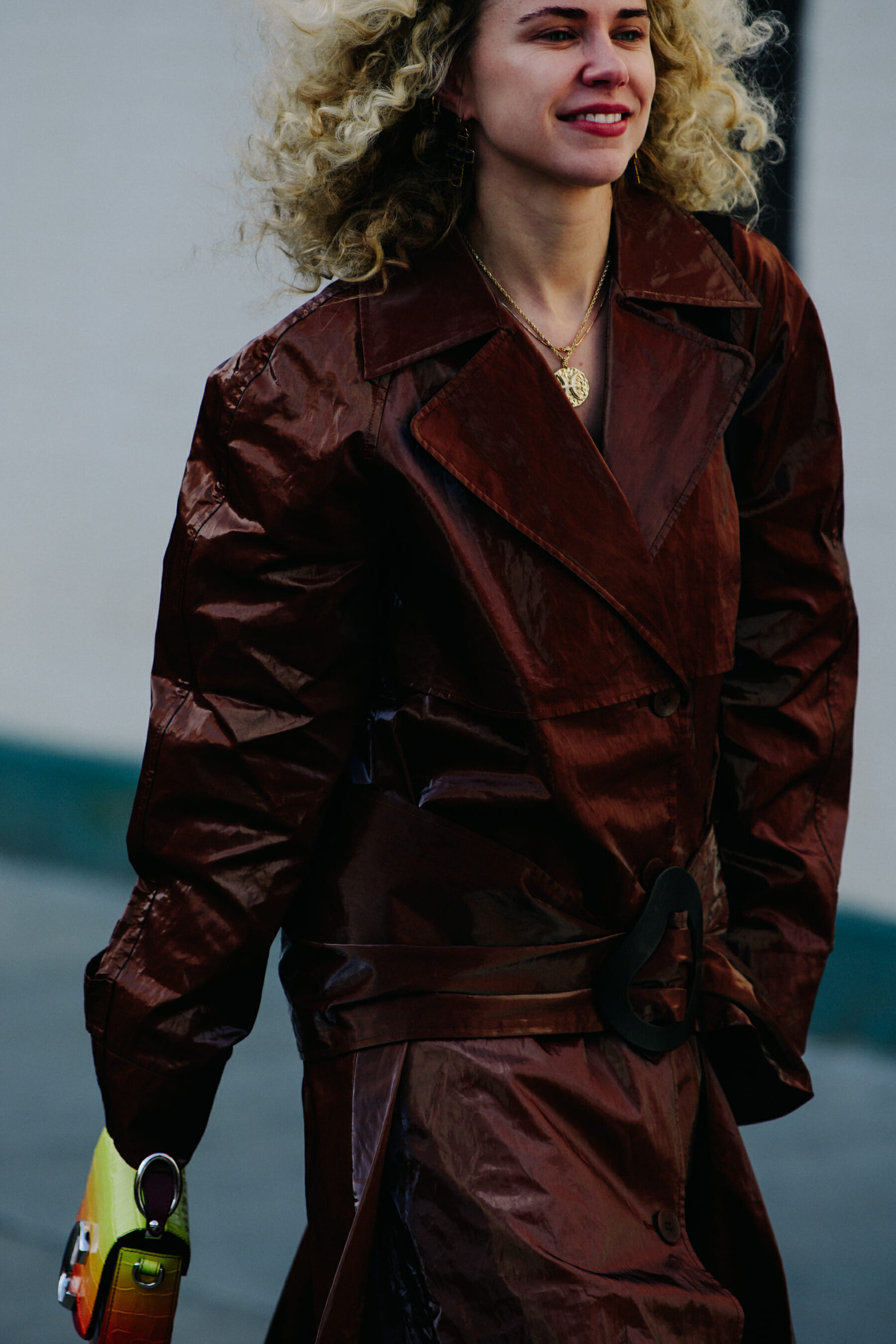Woman wearing brown leather coat
