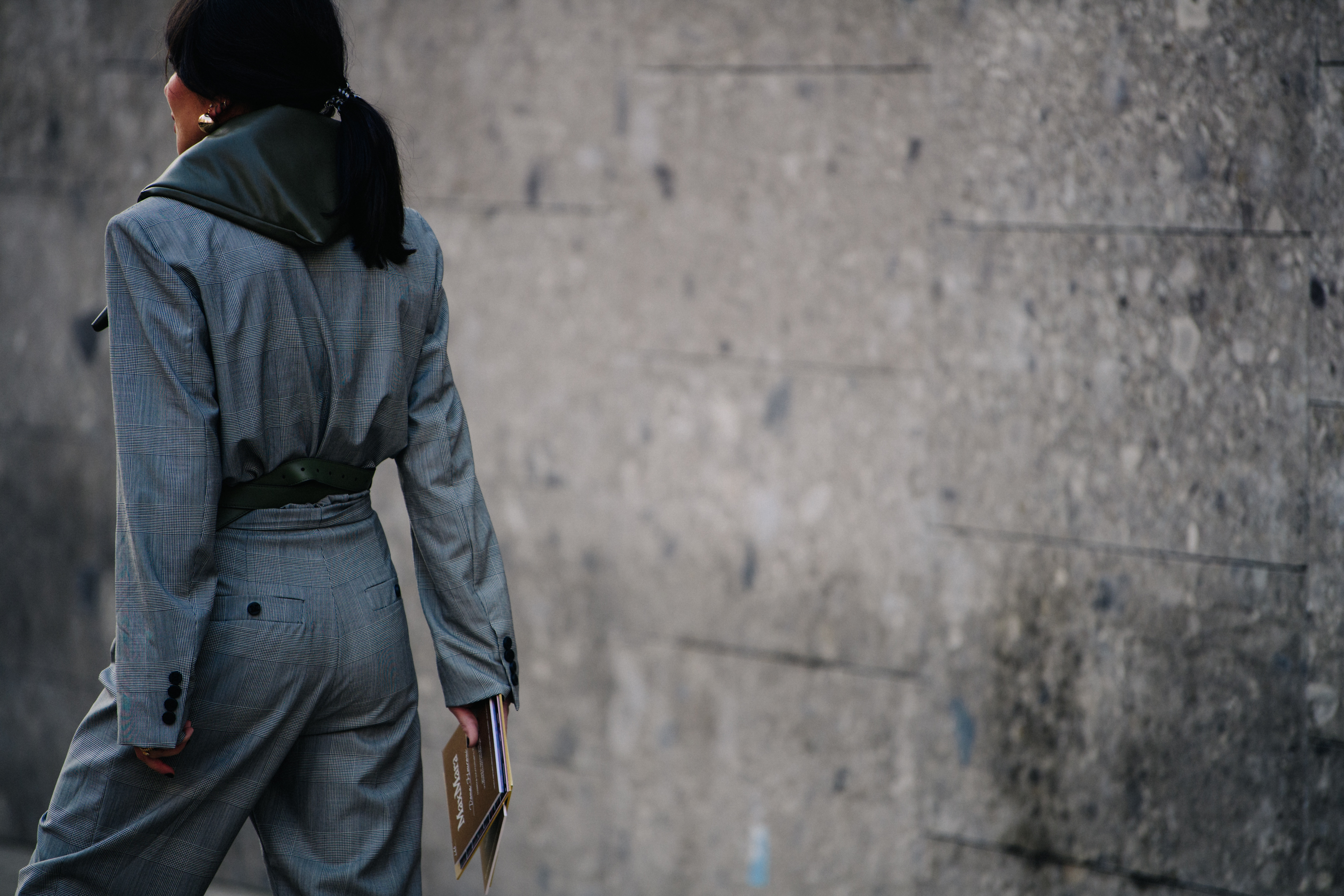 Woman wearing grey jumpsuit