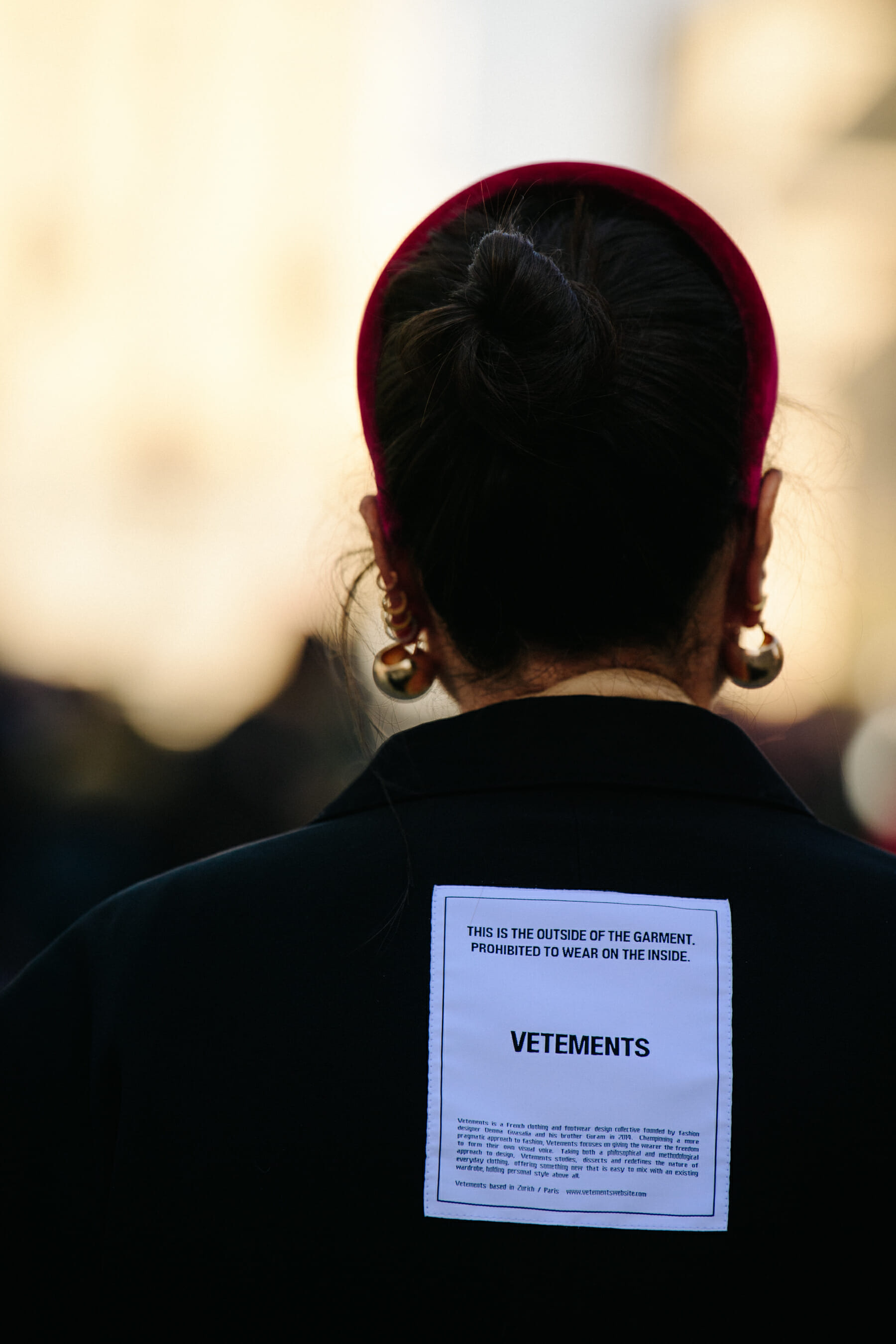 Woman wearing Vetements jacket