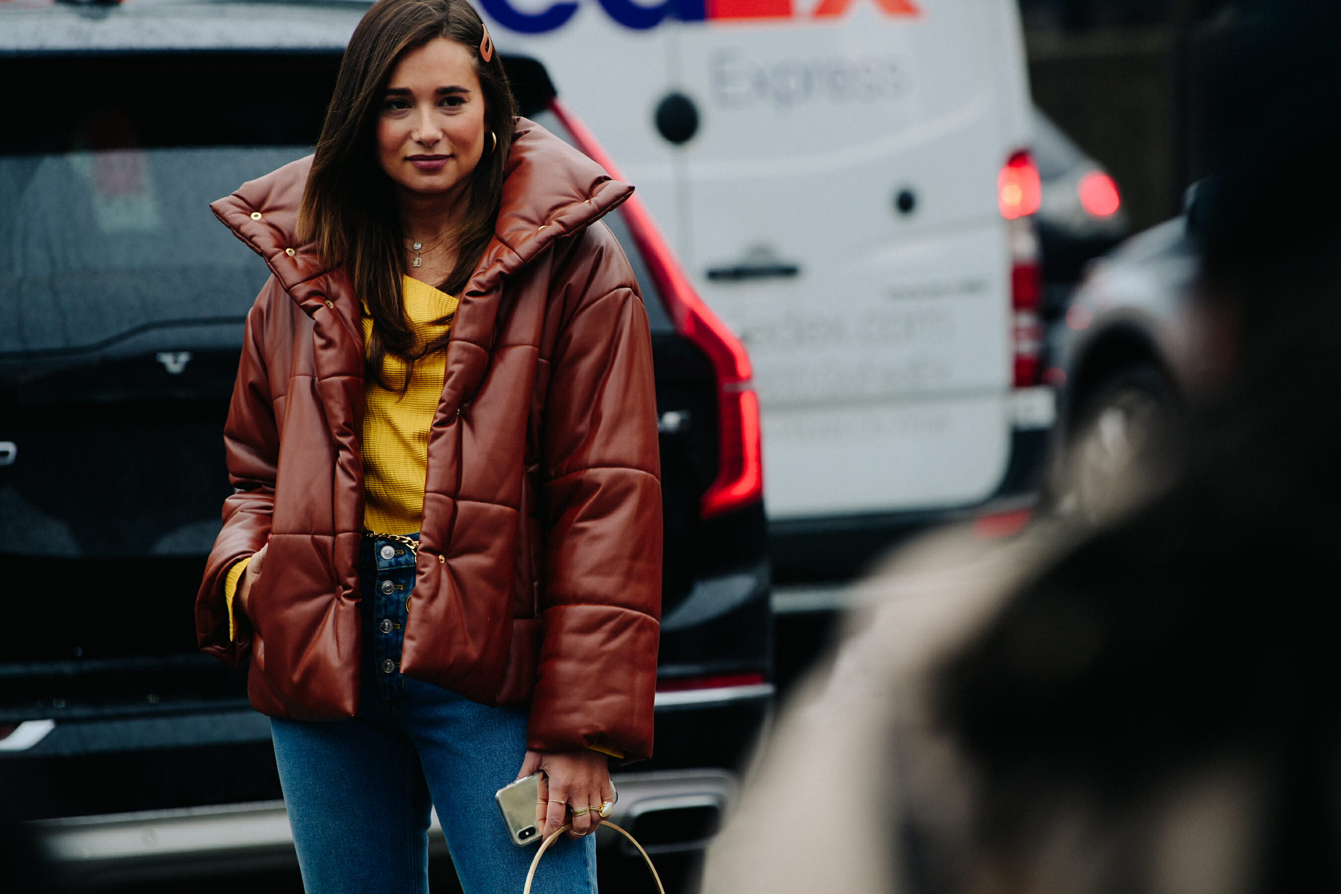 Blogger wearing brown coat