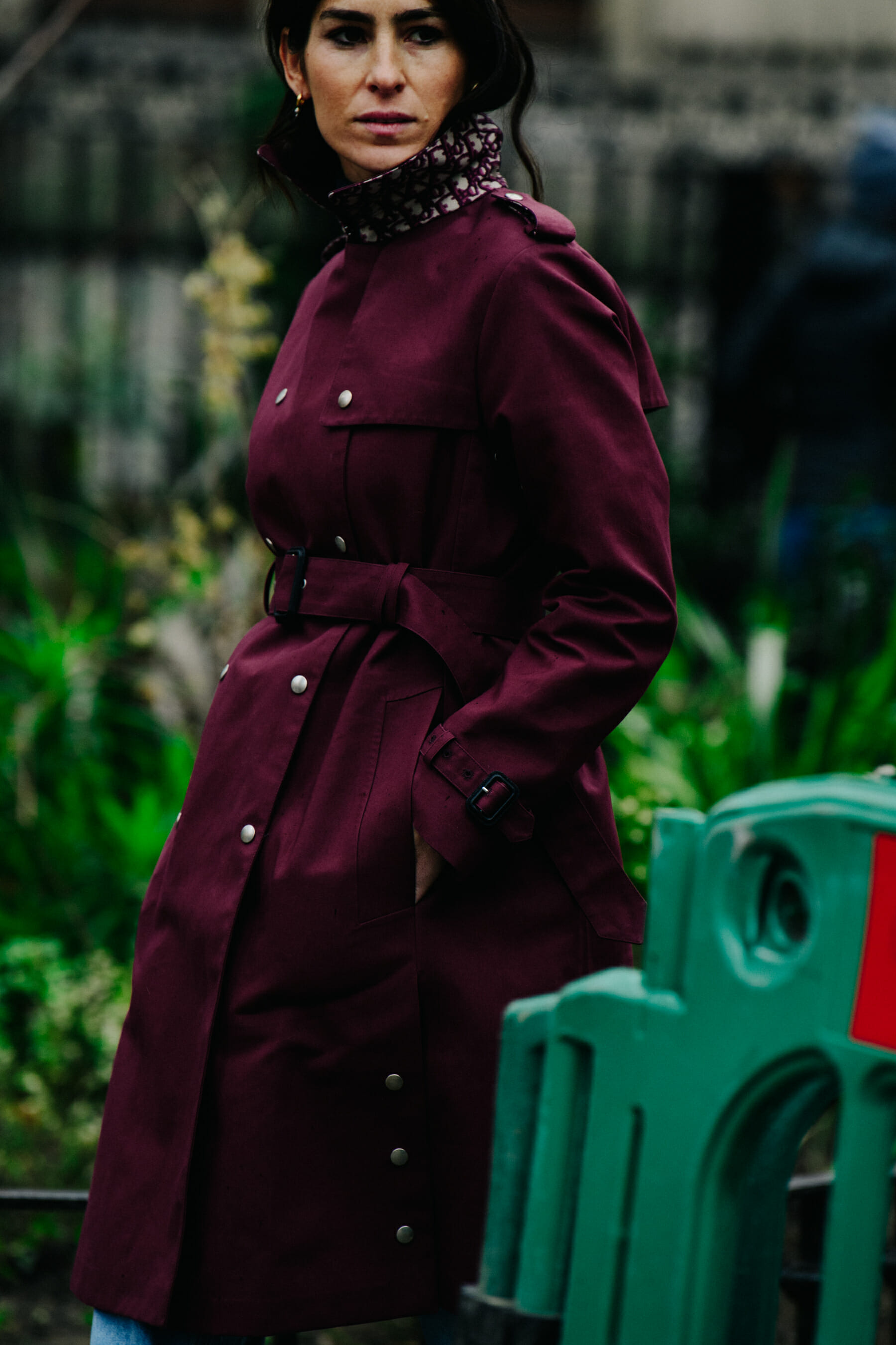 Woman wearing dark red coat