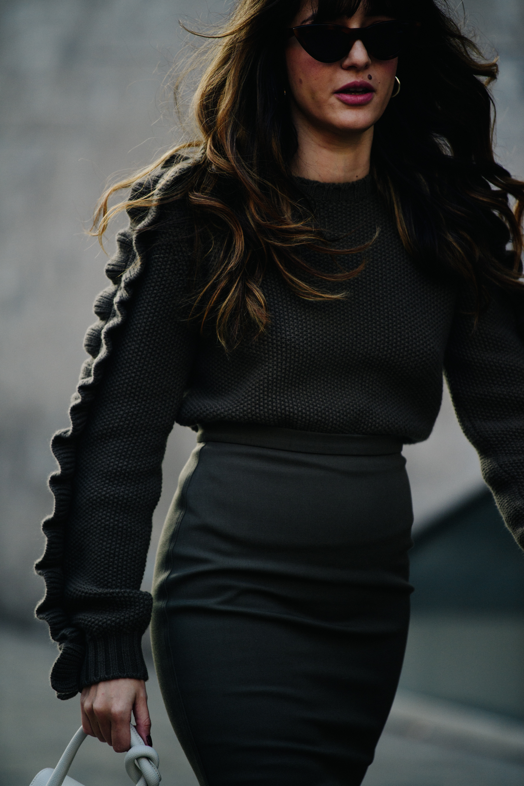 Woman wearing frilled top
