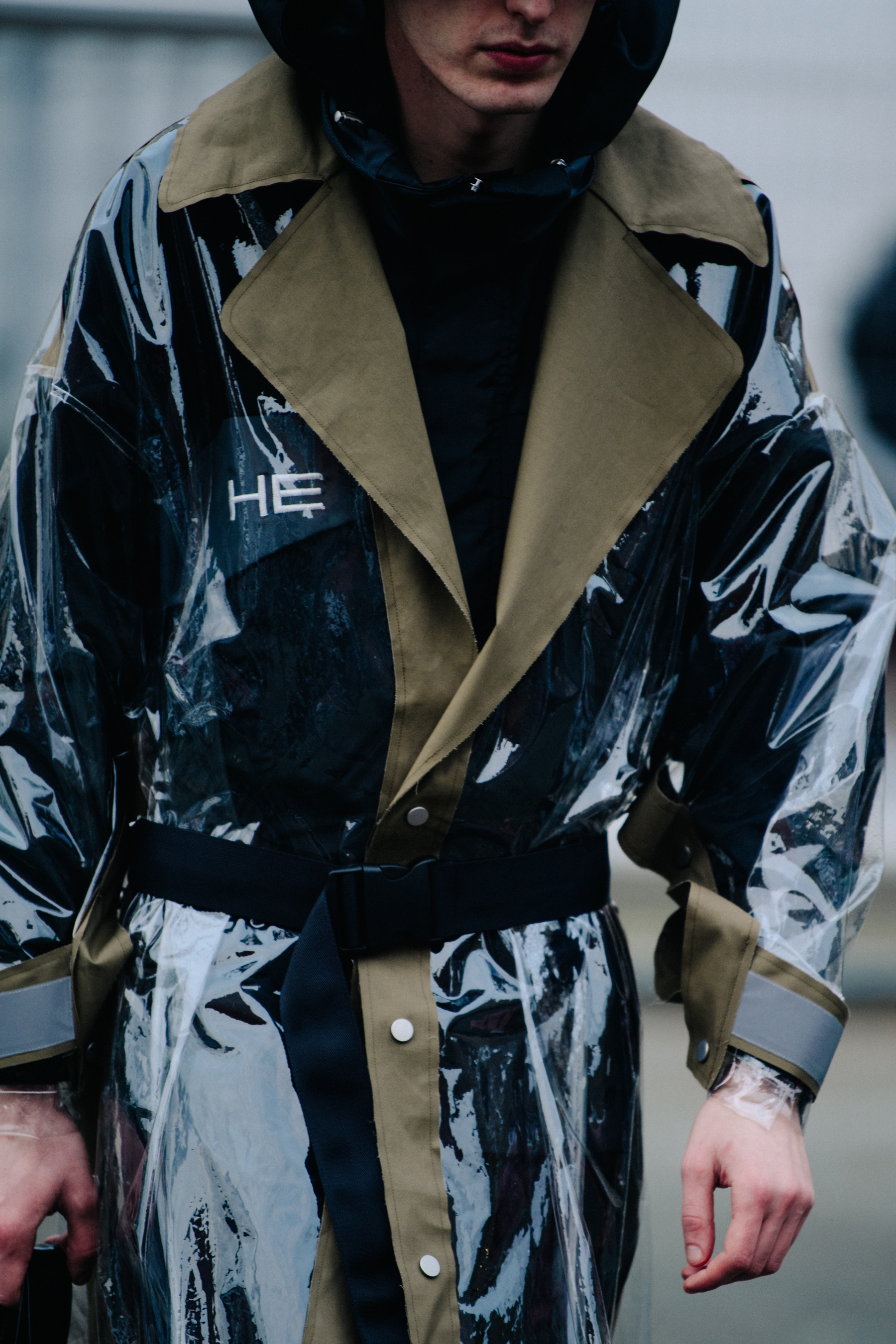 Danish man wearing plastic coat