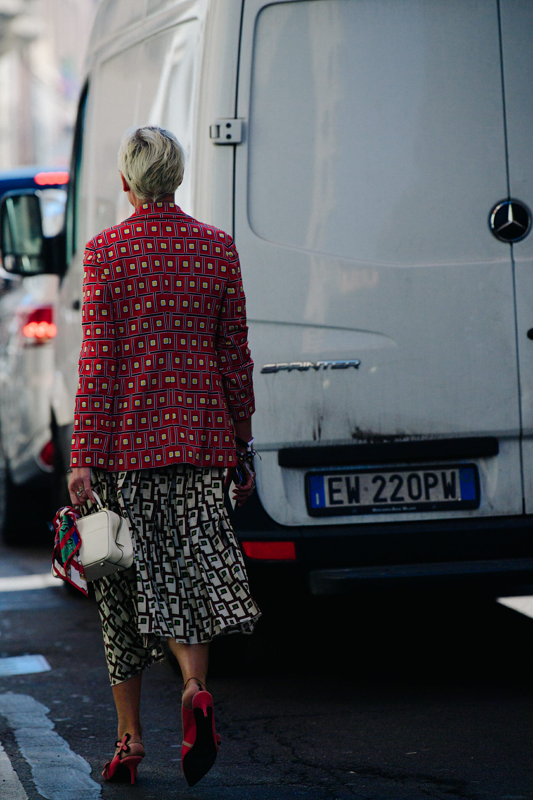 Woman carrying Valextra bag