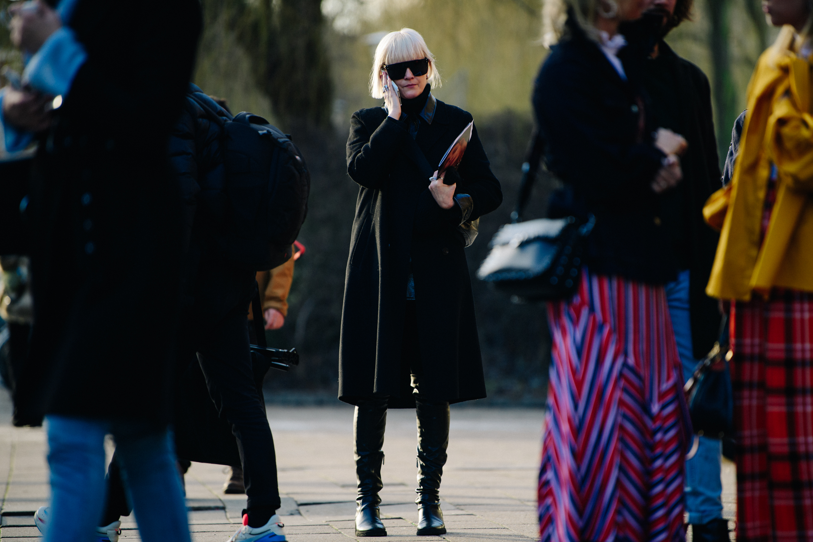 Woman wearing black leather boots