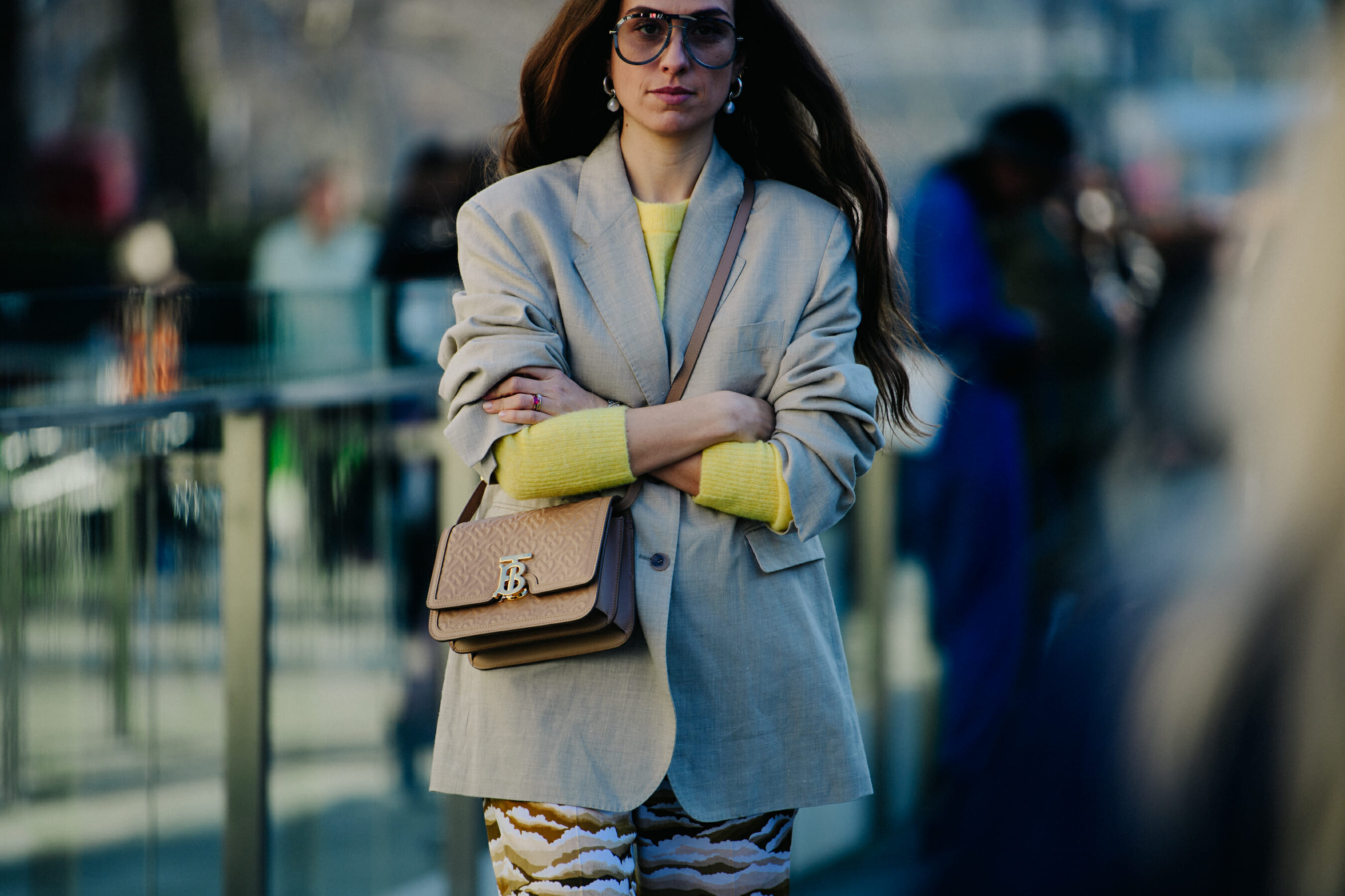 Woman wearing yellow jumper