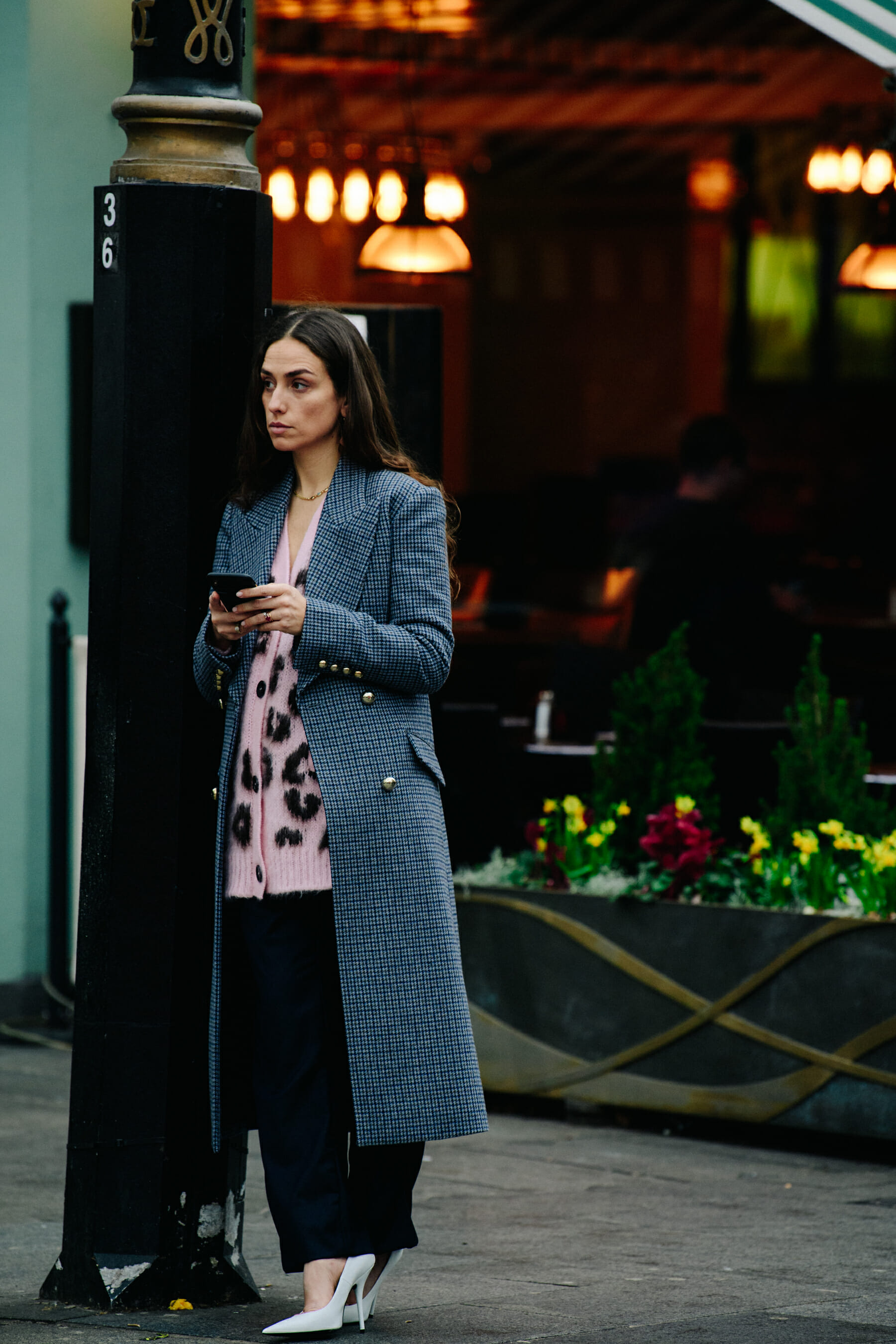 Woman wearing pink wool top