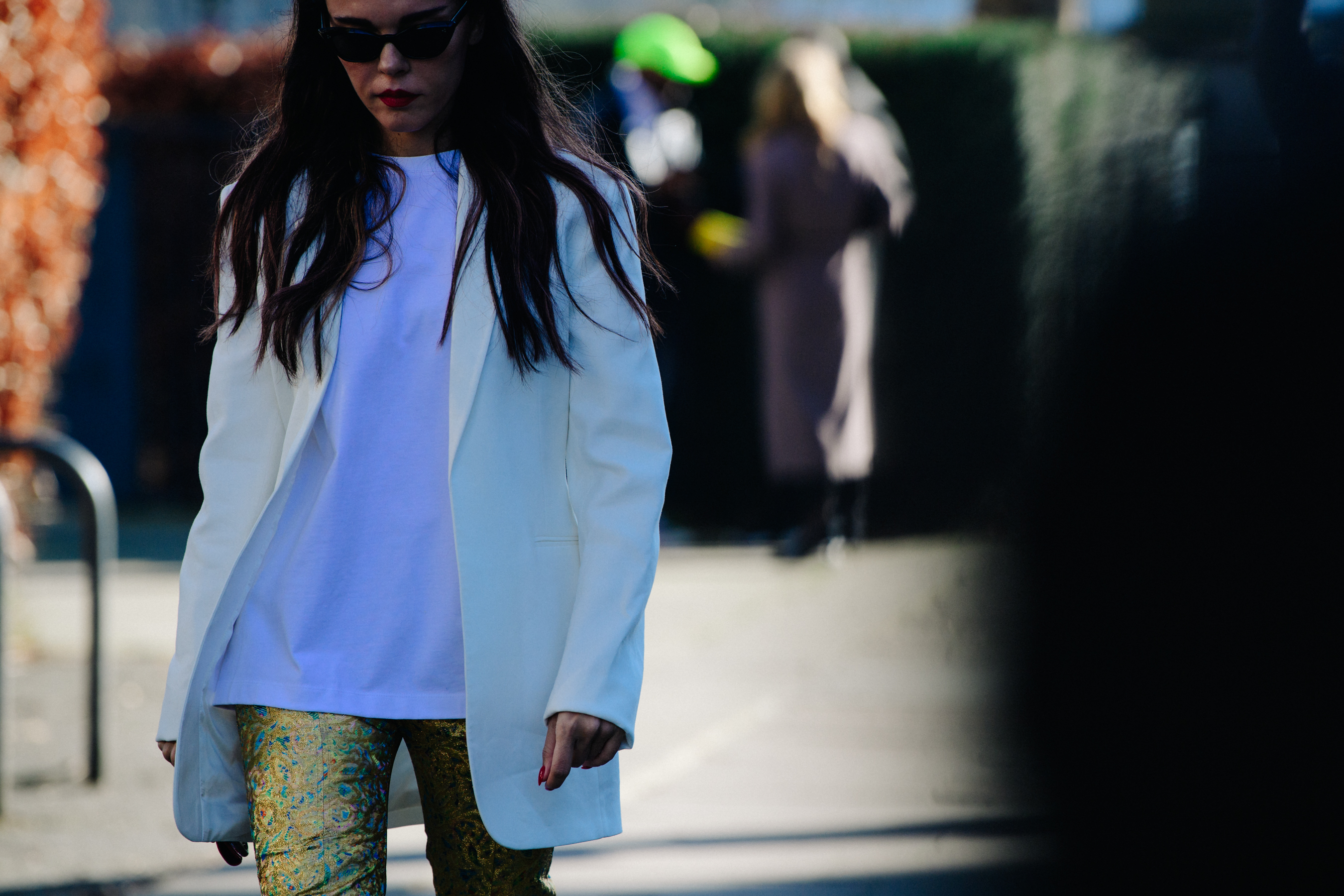 Greek blogger wearing white jacket