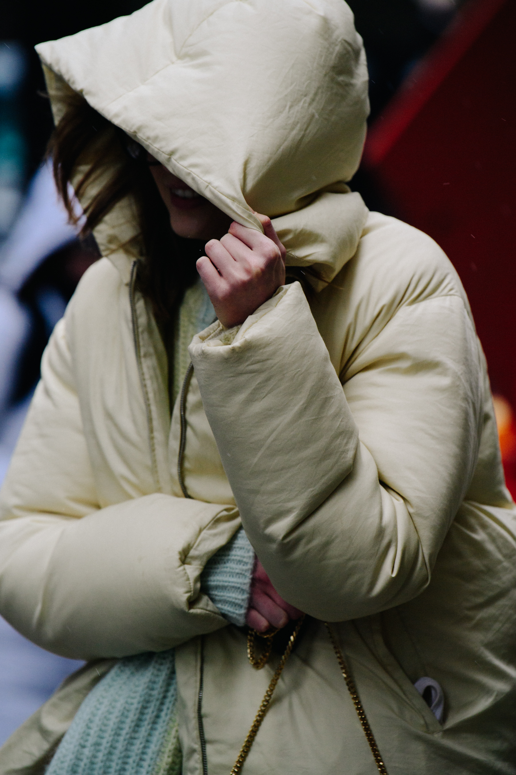 British model wearing white coat