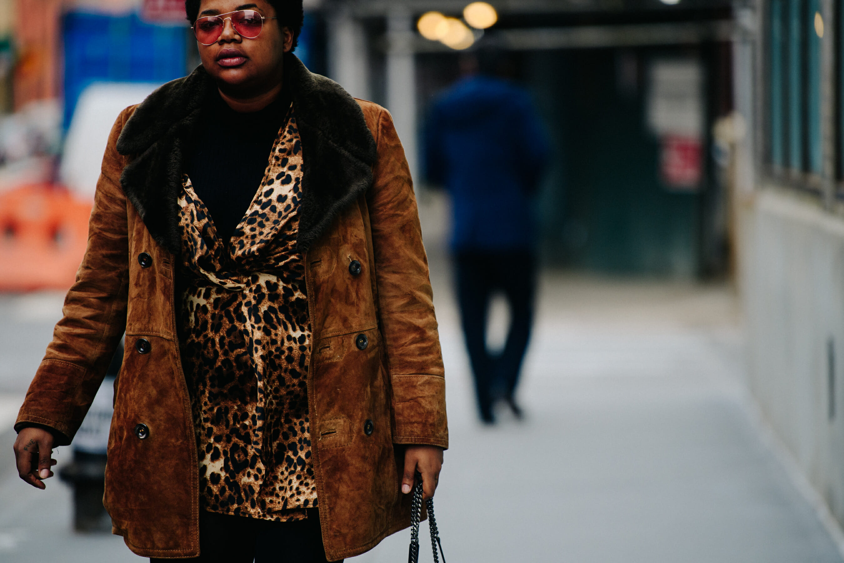 Woman wearing fur trim coat